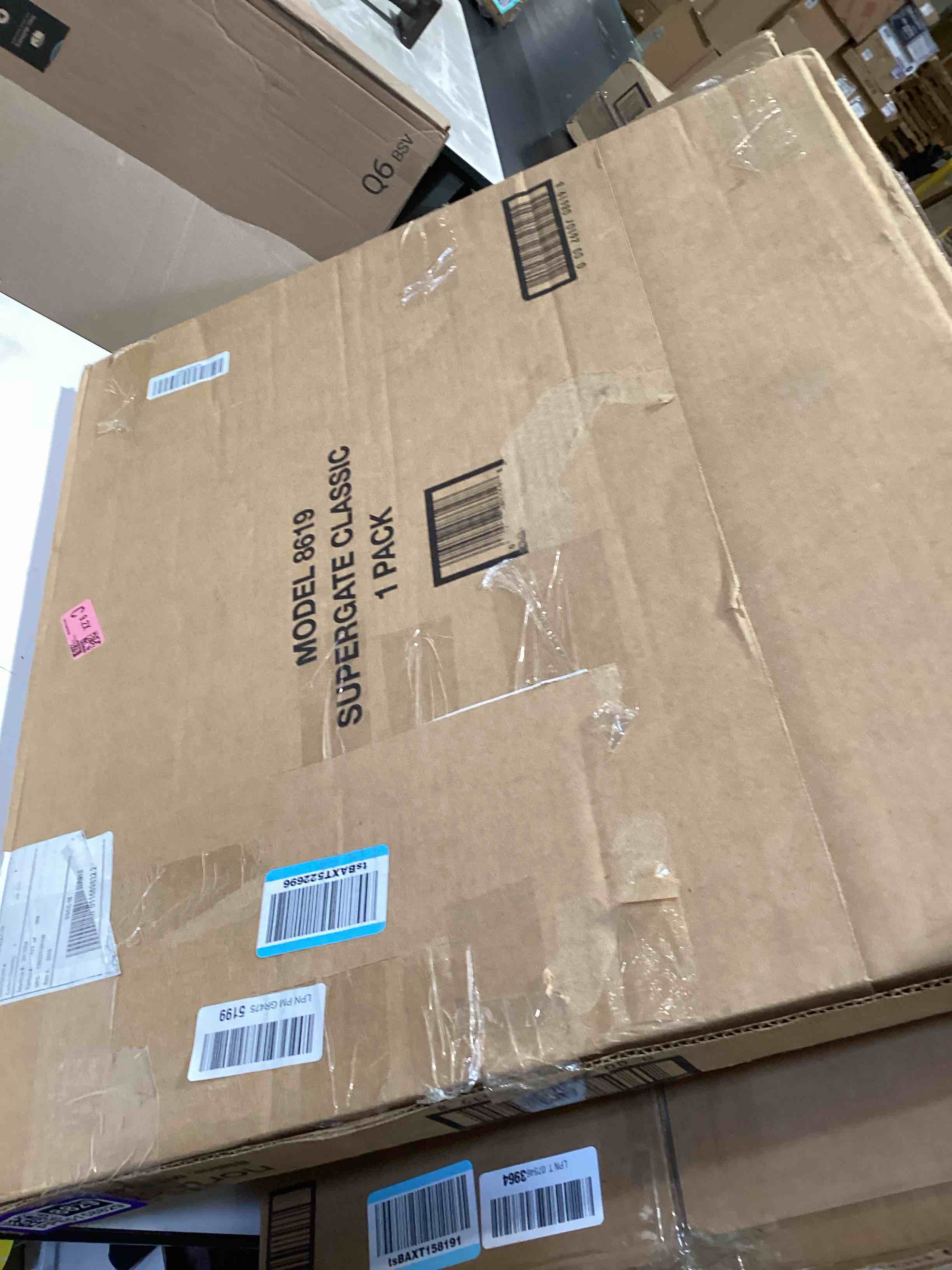 Condition photo showing Good Condition for mypet universal pet gate: 26” - 42” wide dog gate for doorways with pressure fit or swinging door hardware mounting types included: 26" tall; gray