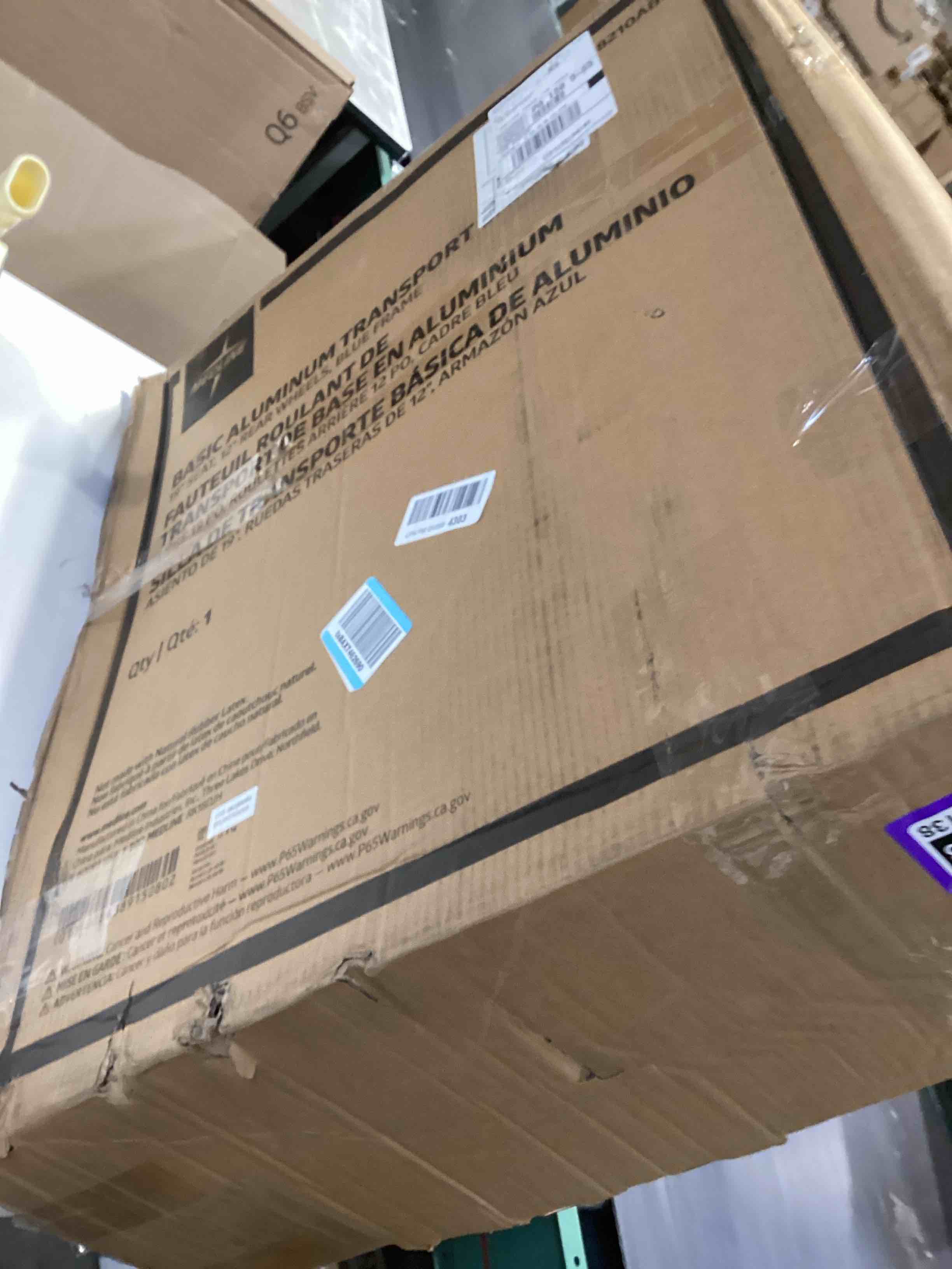 Condition photo showing Good Condition for medline lightweight foldable transport wheelchair with handbrakes and 12-inch wheels blue frame black upholstery