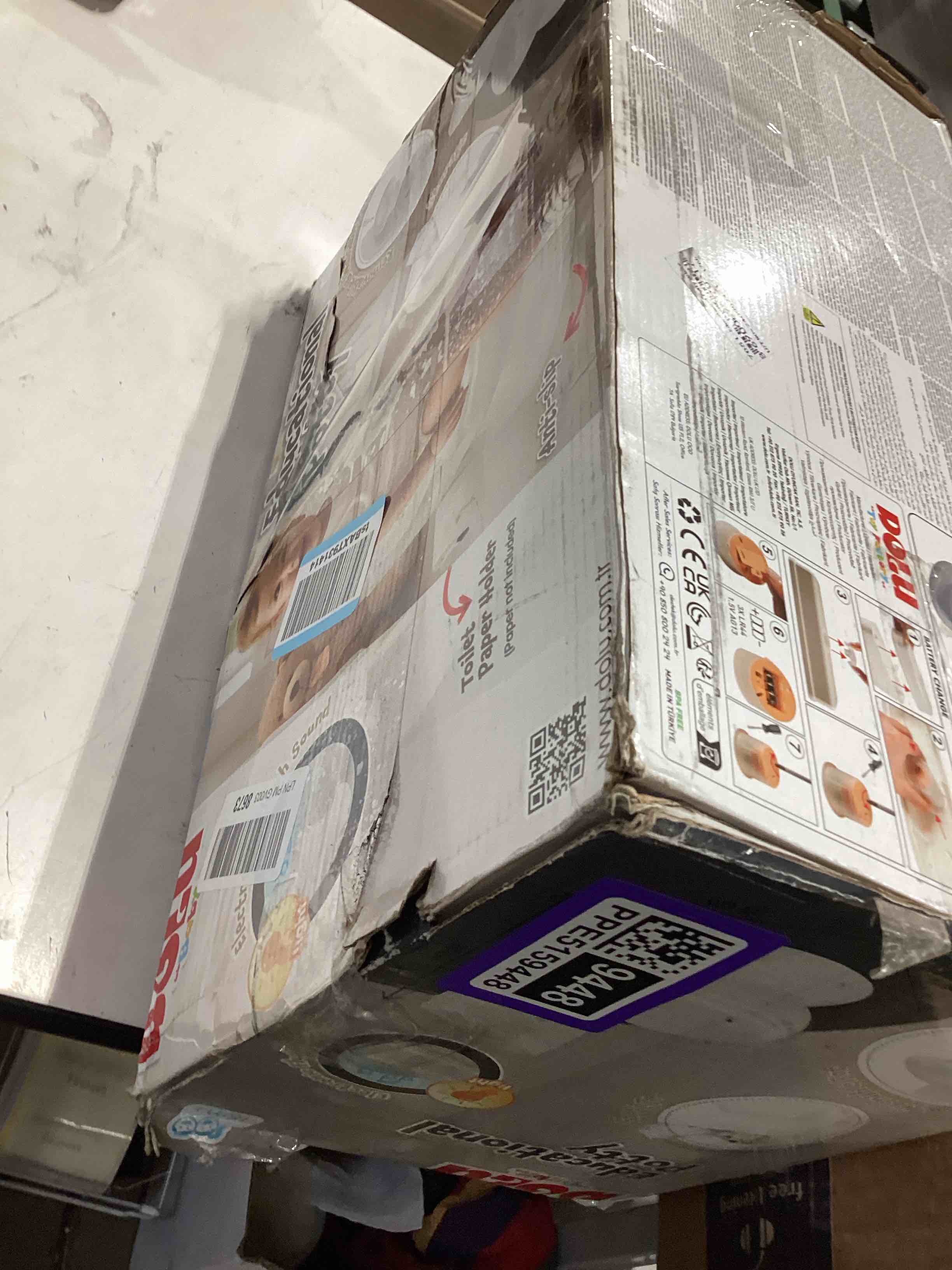 Condition photo showing As Is for ingenuity my size potty pro 2-in-1 potty training toilet, floor potty with removable potty seat for standard toilets, realistic flushing sound, for toddlers ages 18+ months, up to 50 lb white