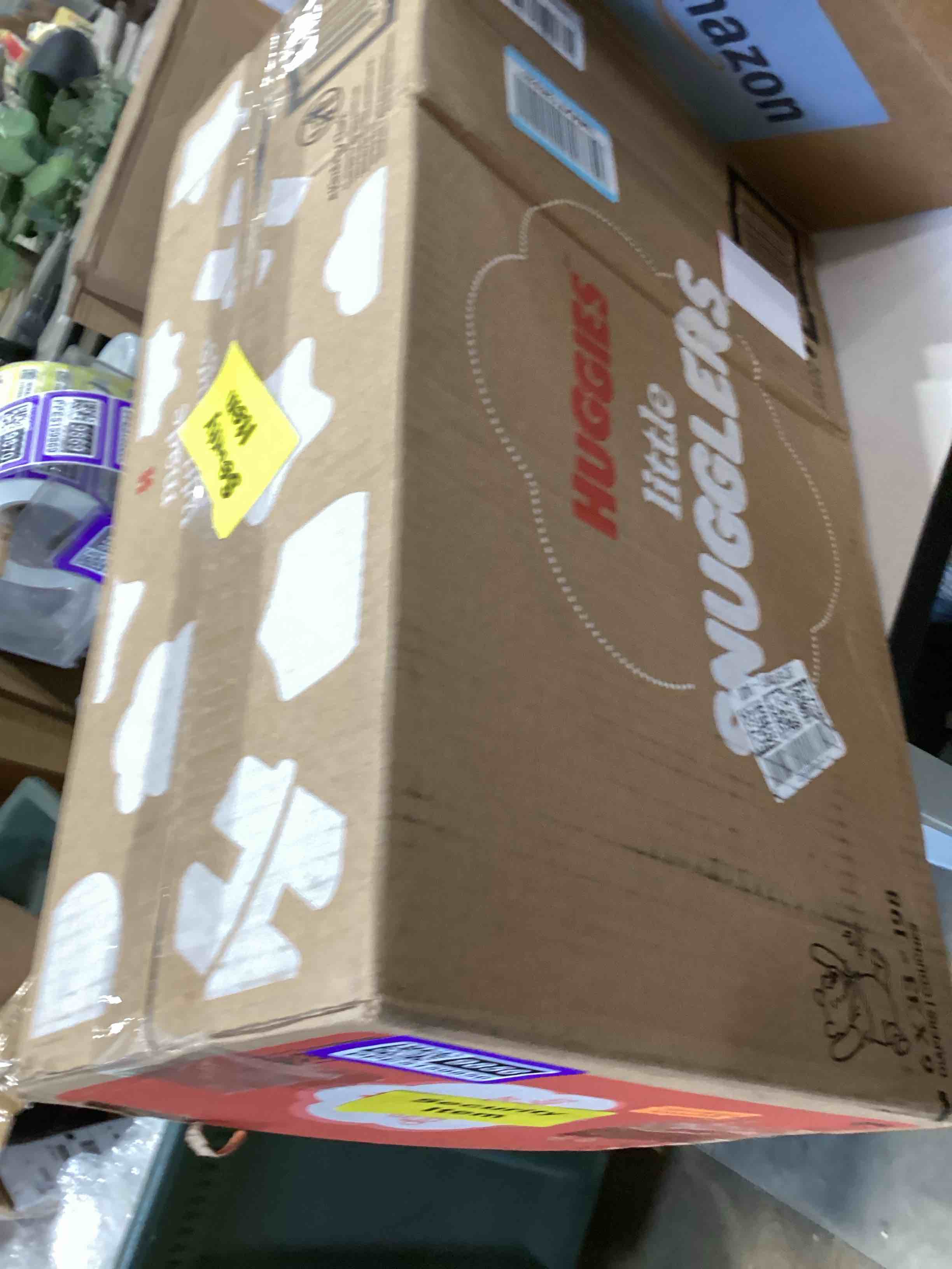 Condition photo showing Good Condition for huggies size 1 diapers, little snugglers diapers, size 1 (8-14 lbs), 198 count (6 packs of 33), packaging may vary size 1 198