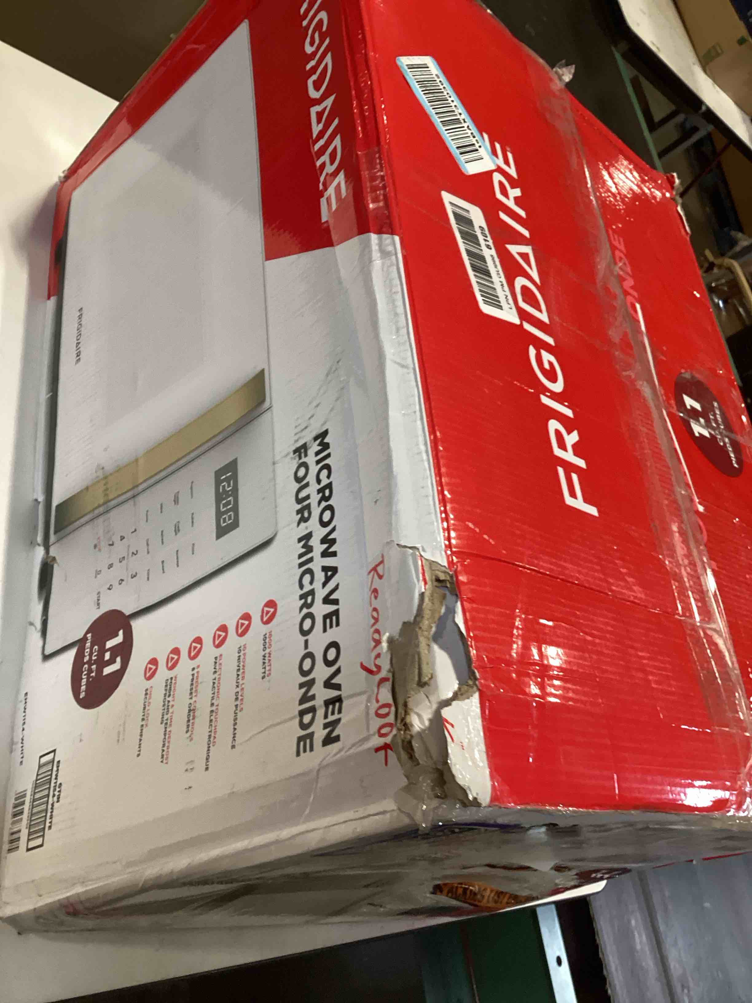 Condition photo showing As Is for frigidaire 1.05 cu. ft. retro microwave, whitegold