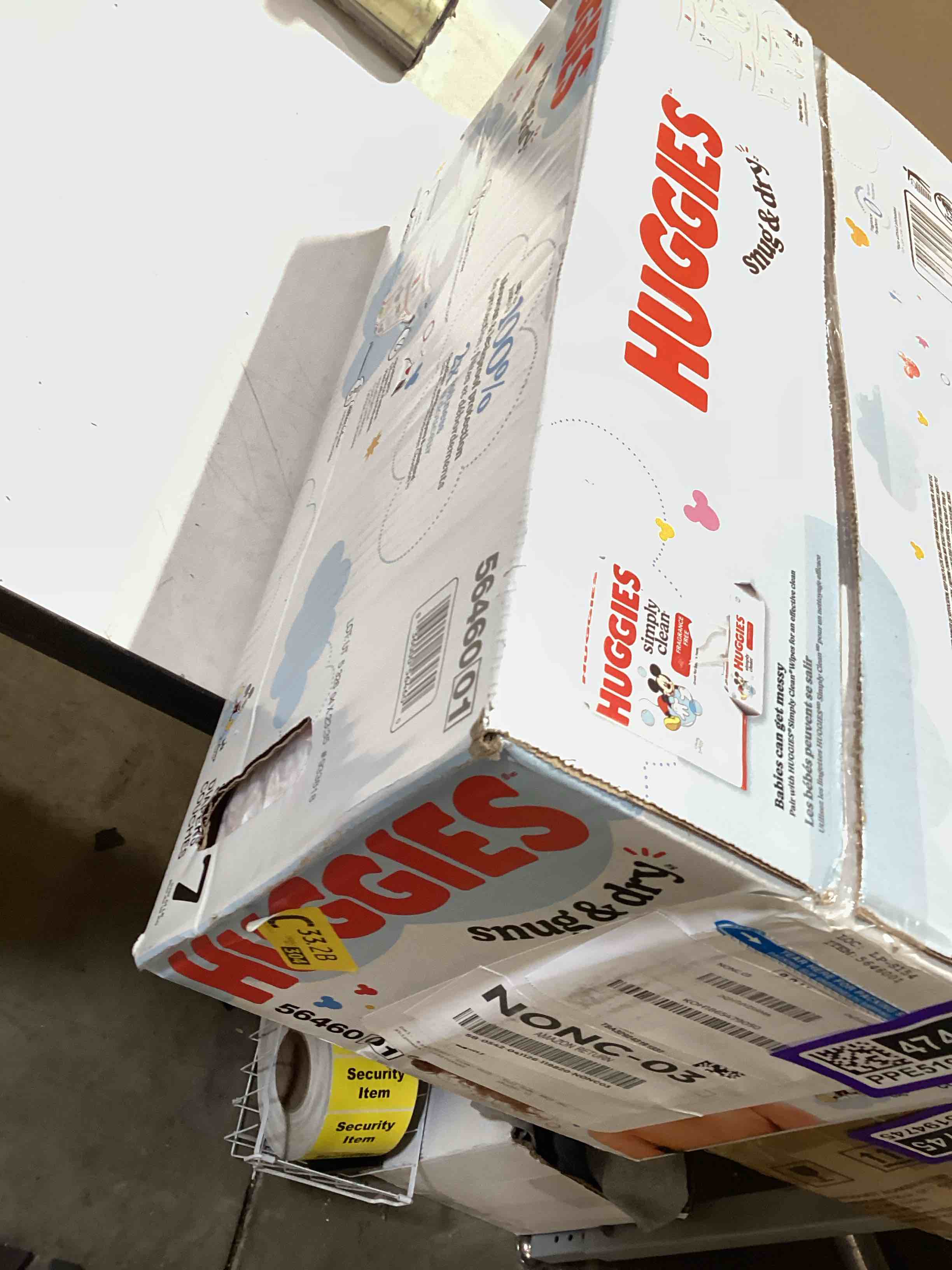 Condition photo showing New/Like New for huggies size 7 diapers, snug & dry baby diapers, size 7 (41+ lbs), 88 count, packaging may vary size 7 88