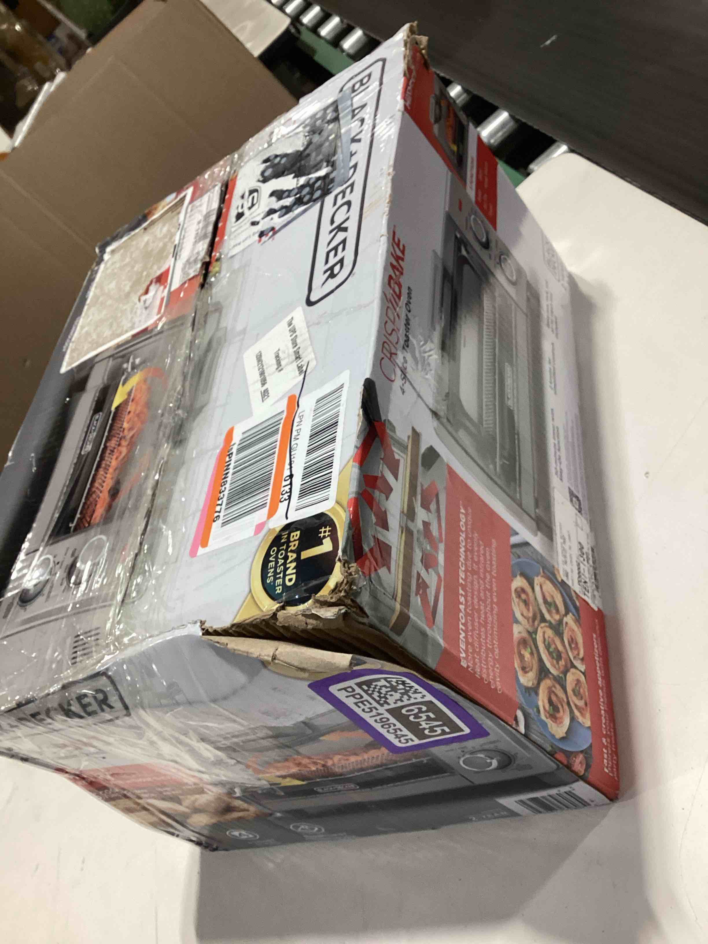 Condition photo showing As Is for black+decker crisp 'n bake air fry countertop convection toaster oven, medium capacity, 4-slice, 5-in-1, fits 9β pizza, 30-min timer, bake, broil, air fry, toast, keep warm, stainless steel