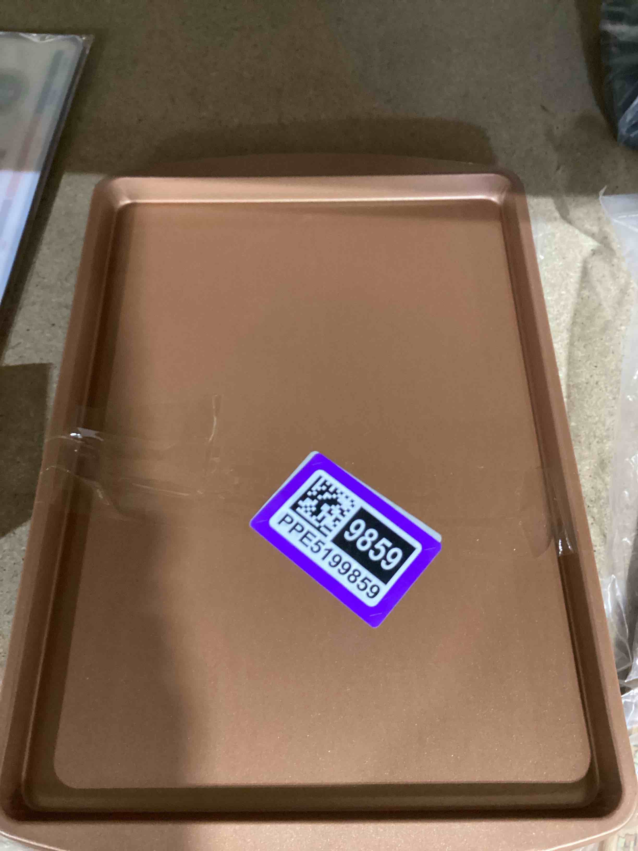Condition photo showing New/Like New for (set of 4) 12”x9.5” copper cookie sheet pans