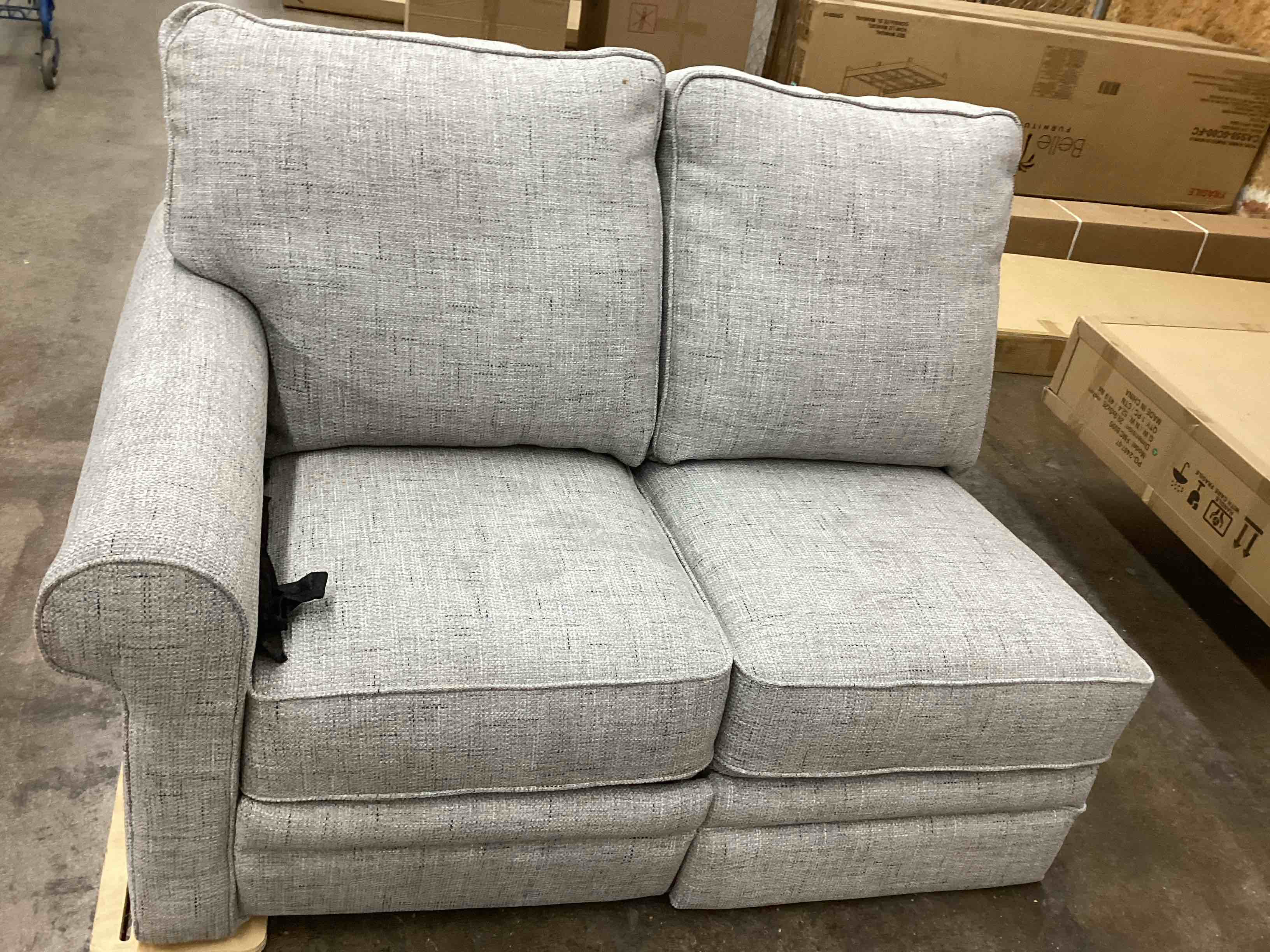 Condition photo showing Good Condition for light grey couch 