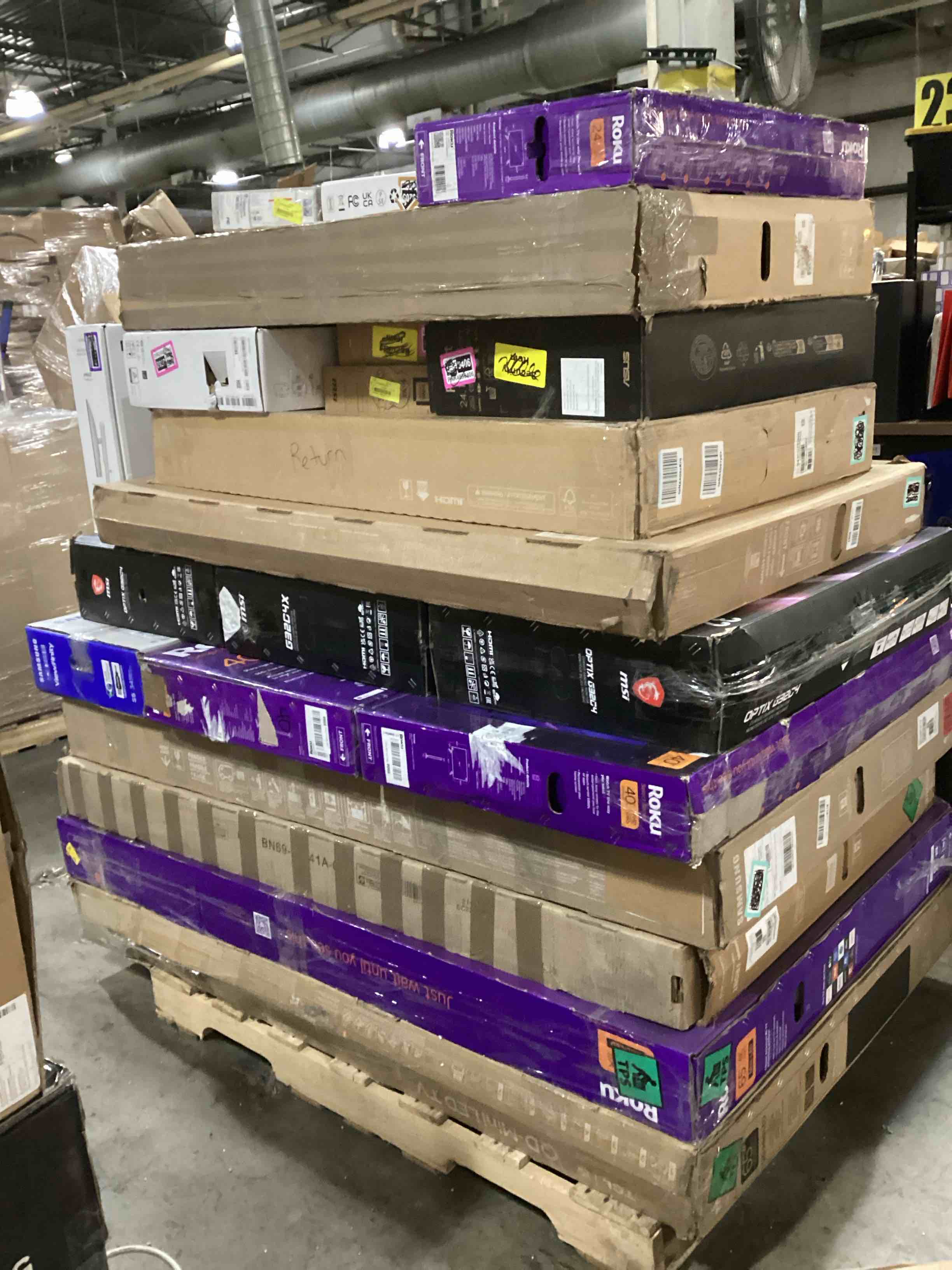 pallet of defective electronics for parts 
