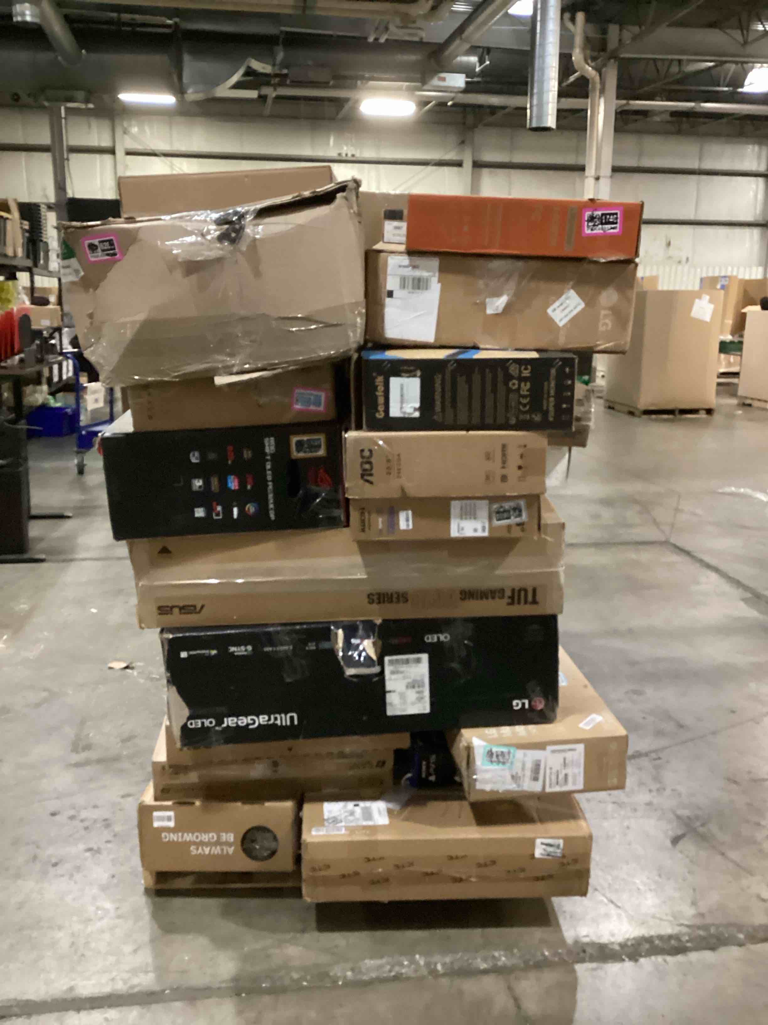 pallet of defective electronics for parts 