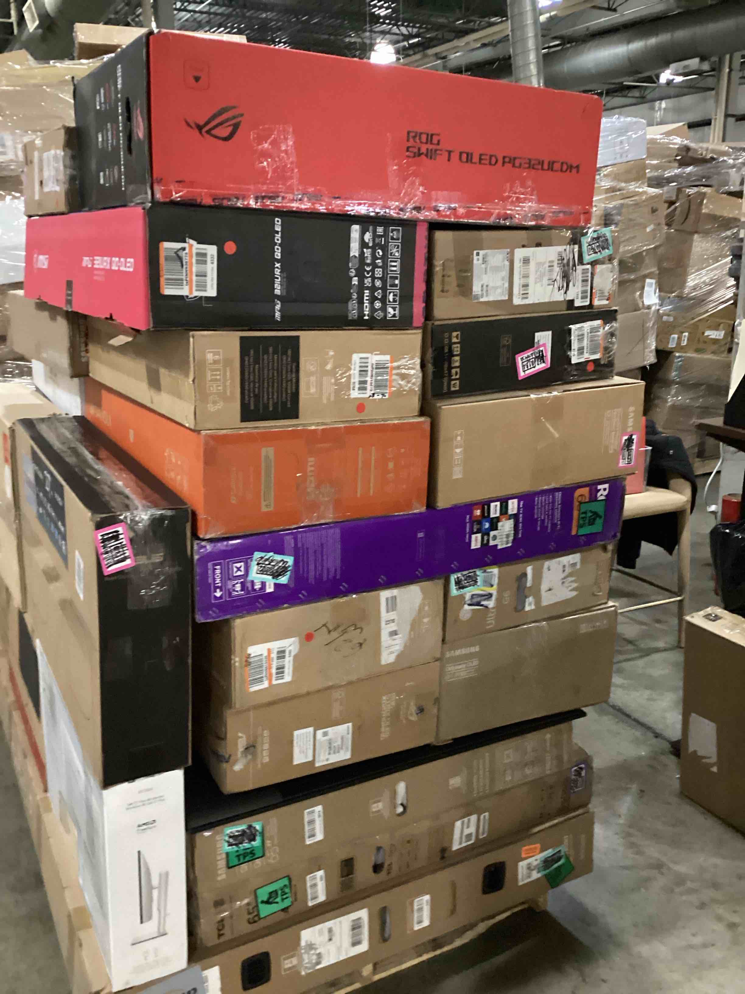 assortment of defective electronics for parts