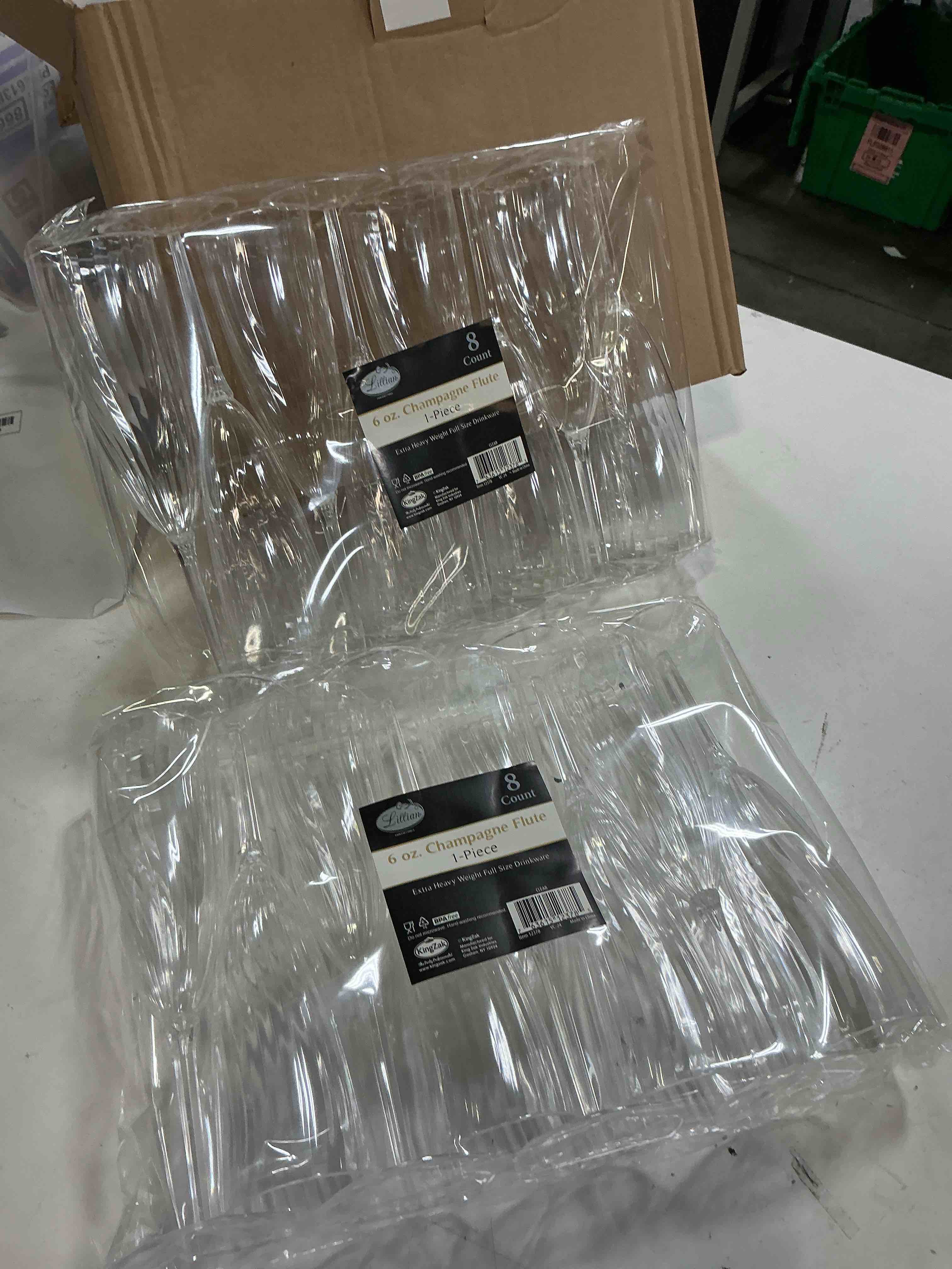 Condition photo showing As Is for lillian tablesettings premium champagne flutes 6 oz. clear hard plastic 1-piece disposable glasses - 16 count champagne flutes - 16 count
