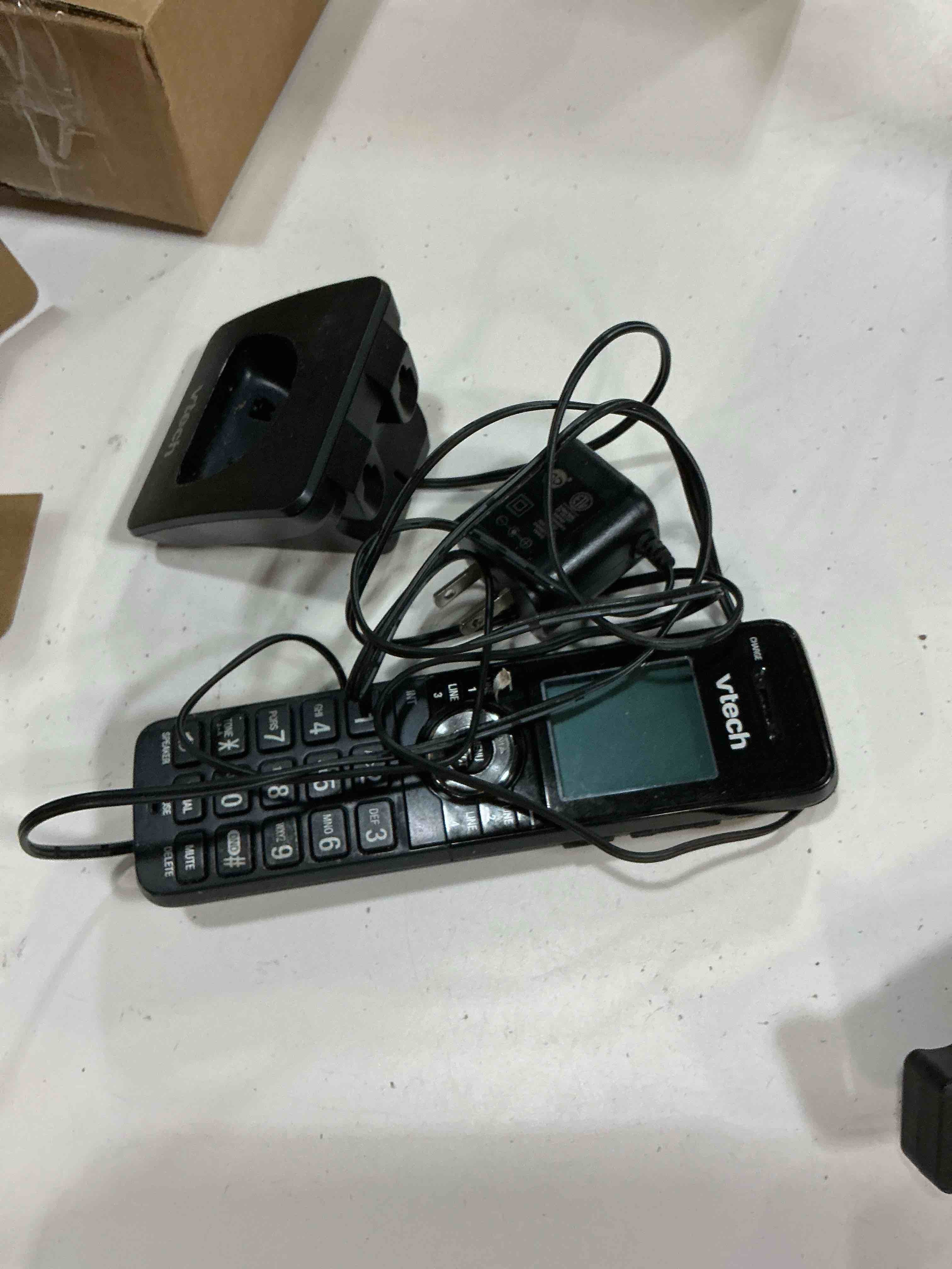Condition photo showing As Is for vtech am18047 cordless accessory handset for am18447 4-line small business phone system - dect 6.0, full-duplex speakerphone, caller id, expandable, black accessory cordless handset | black