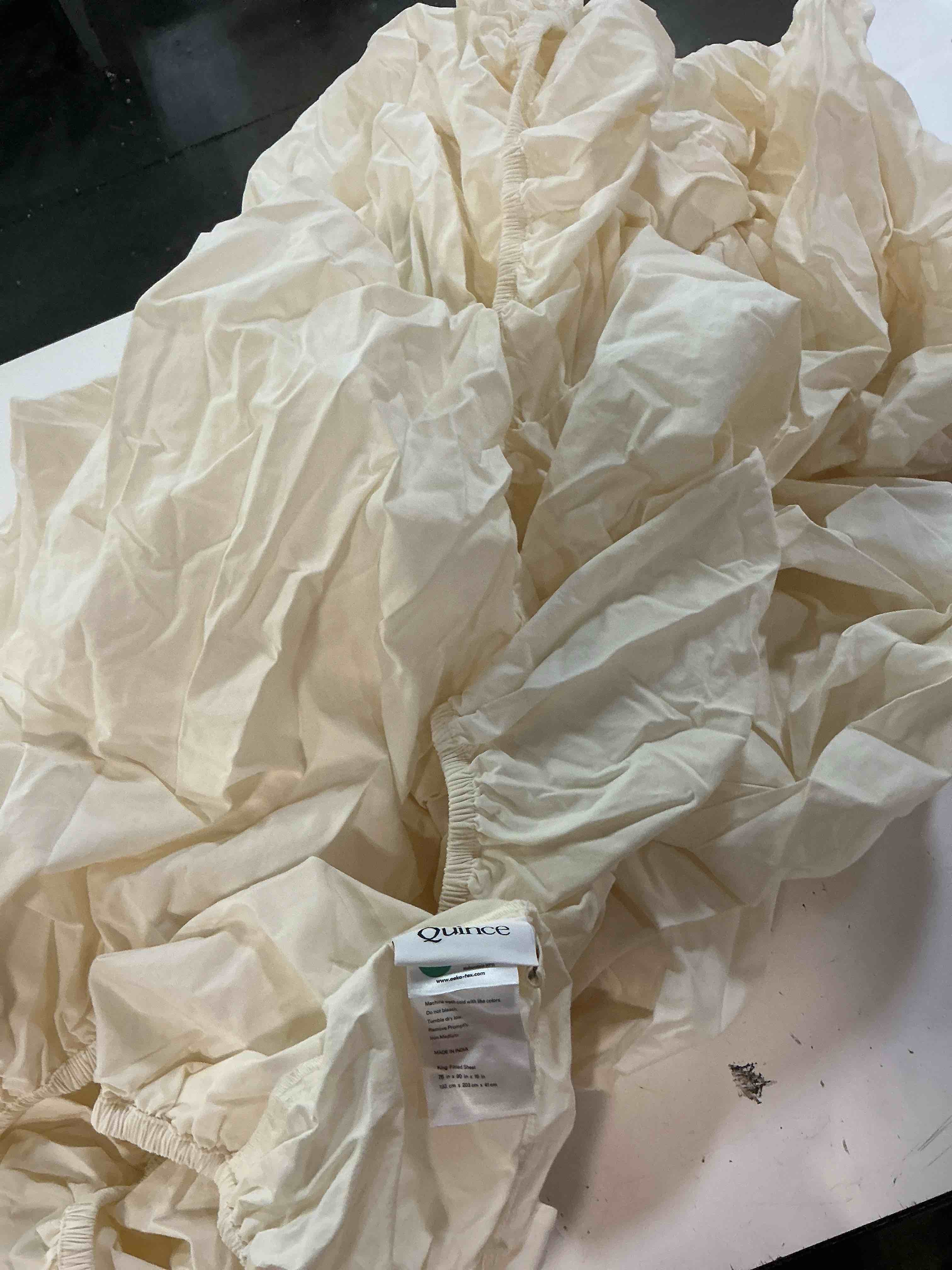 Condition photo showing As Is for (incomplete)organic crisp percale fitted sheet set