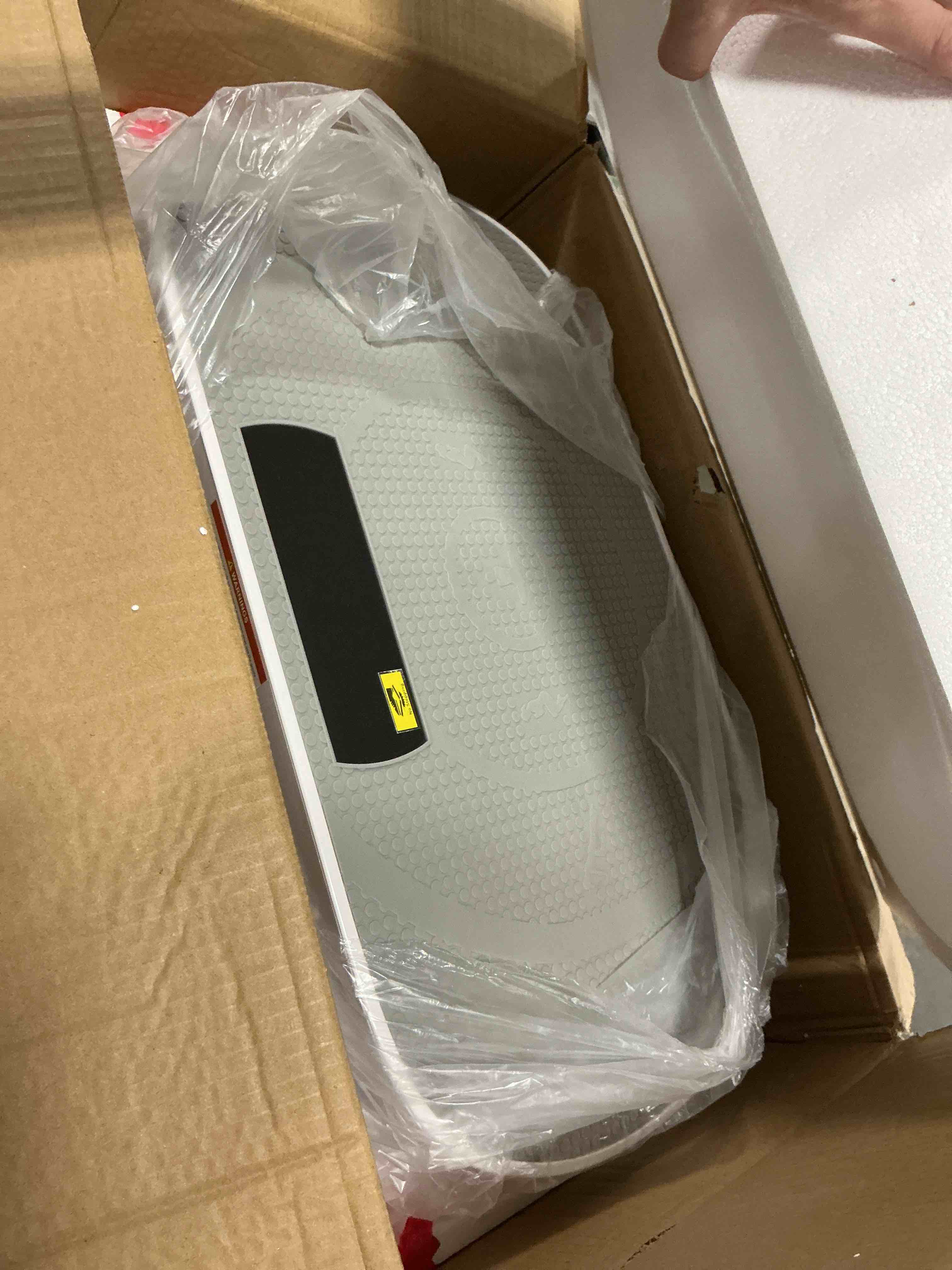 Condition photo showing As Is for curved portable slim vibration plate for beginners