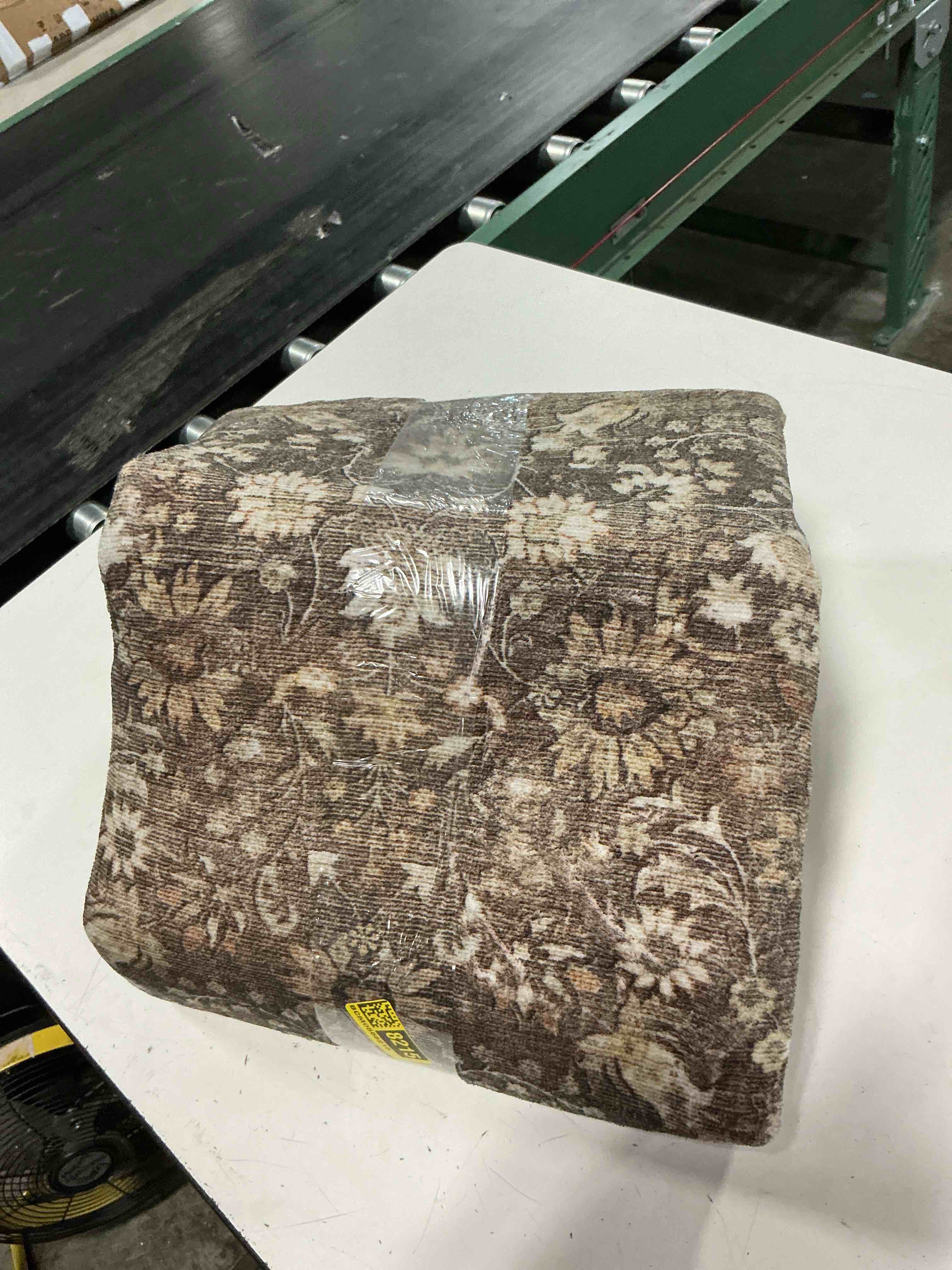 Condition photo showing As Is for brown vintage rug (size unknown)