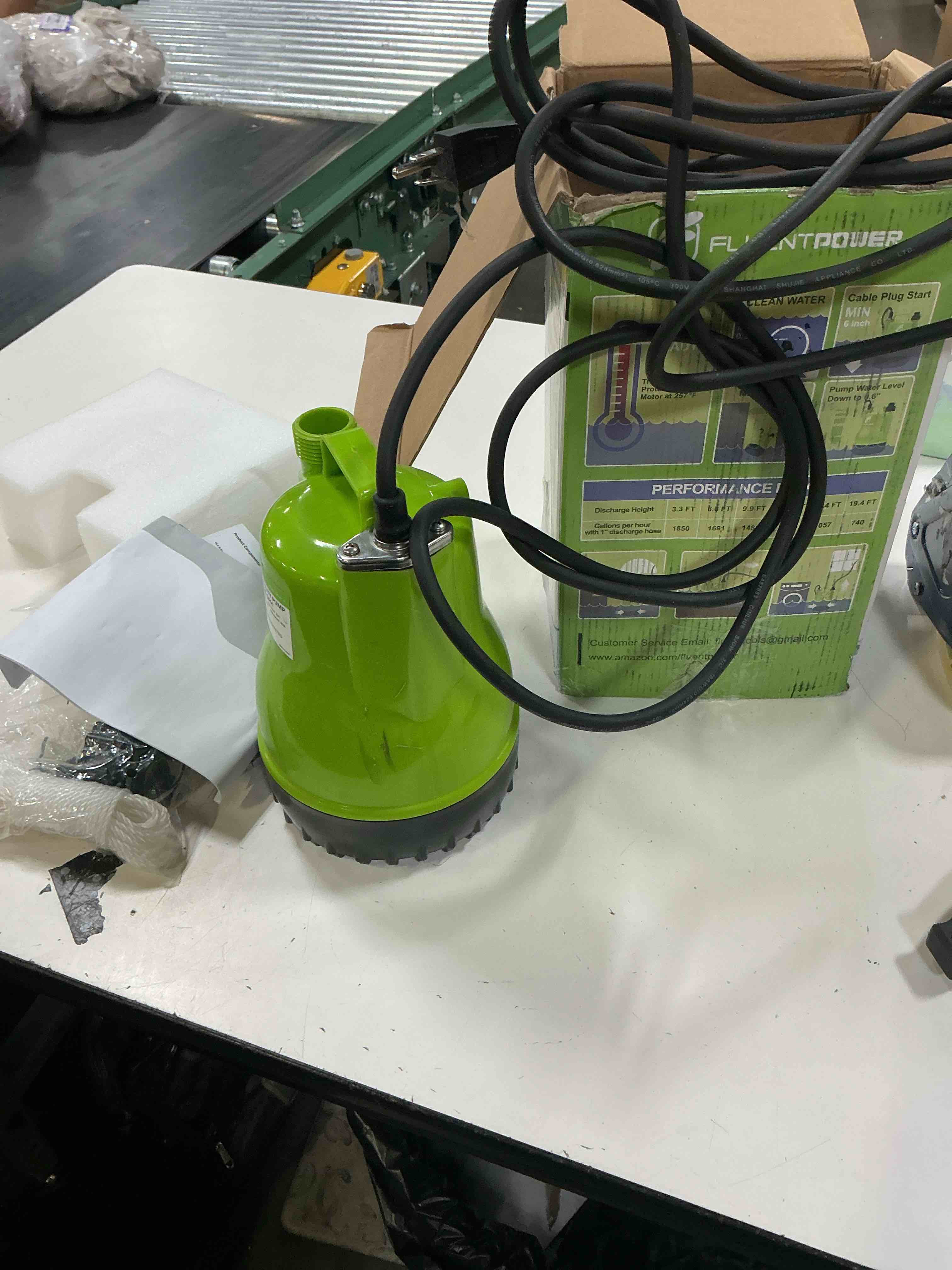 Condition photo showing As Is for fluentpower 1/4hp utility pump 1900gph portable submersible sump pump, manual control with 16.4 ft cord for draining water from pool pond garden hot tub basement tankless heater liquids