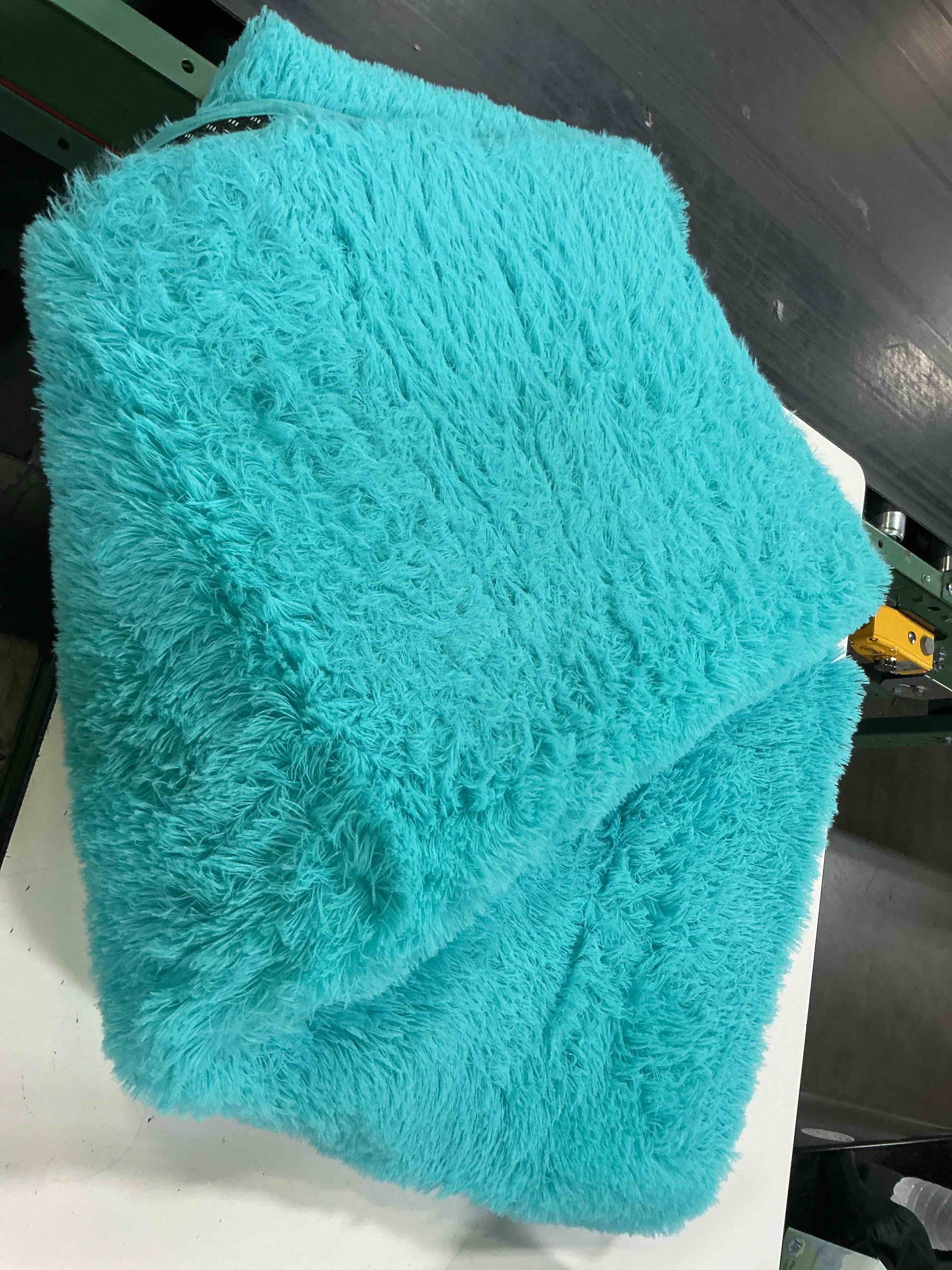 Condition photo showing As Is for teal shag soft rug, medium