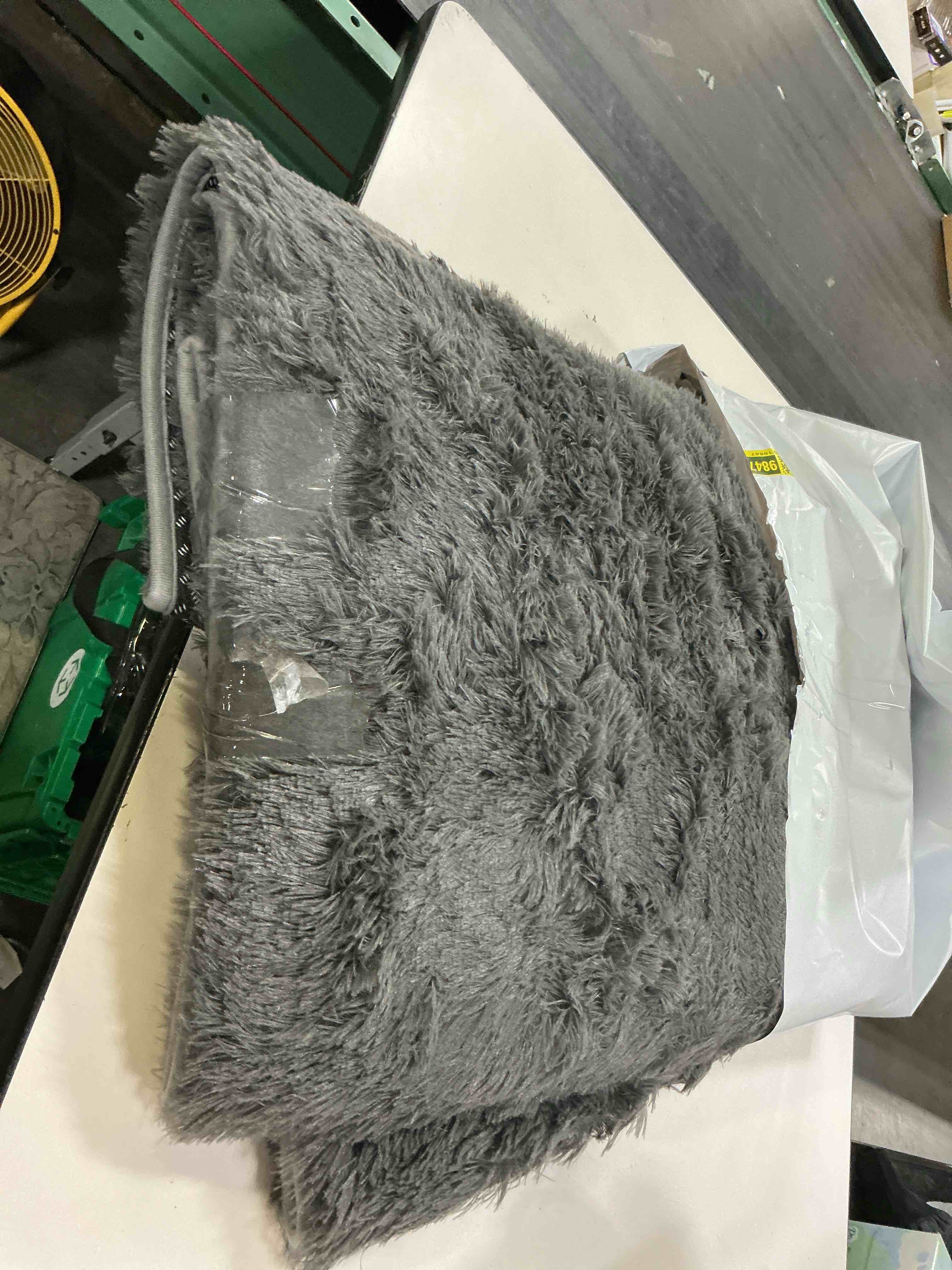 Condition photo showing As Is for grey soft shag rug, medium