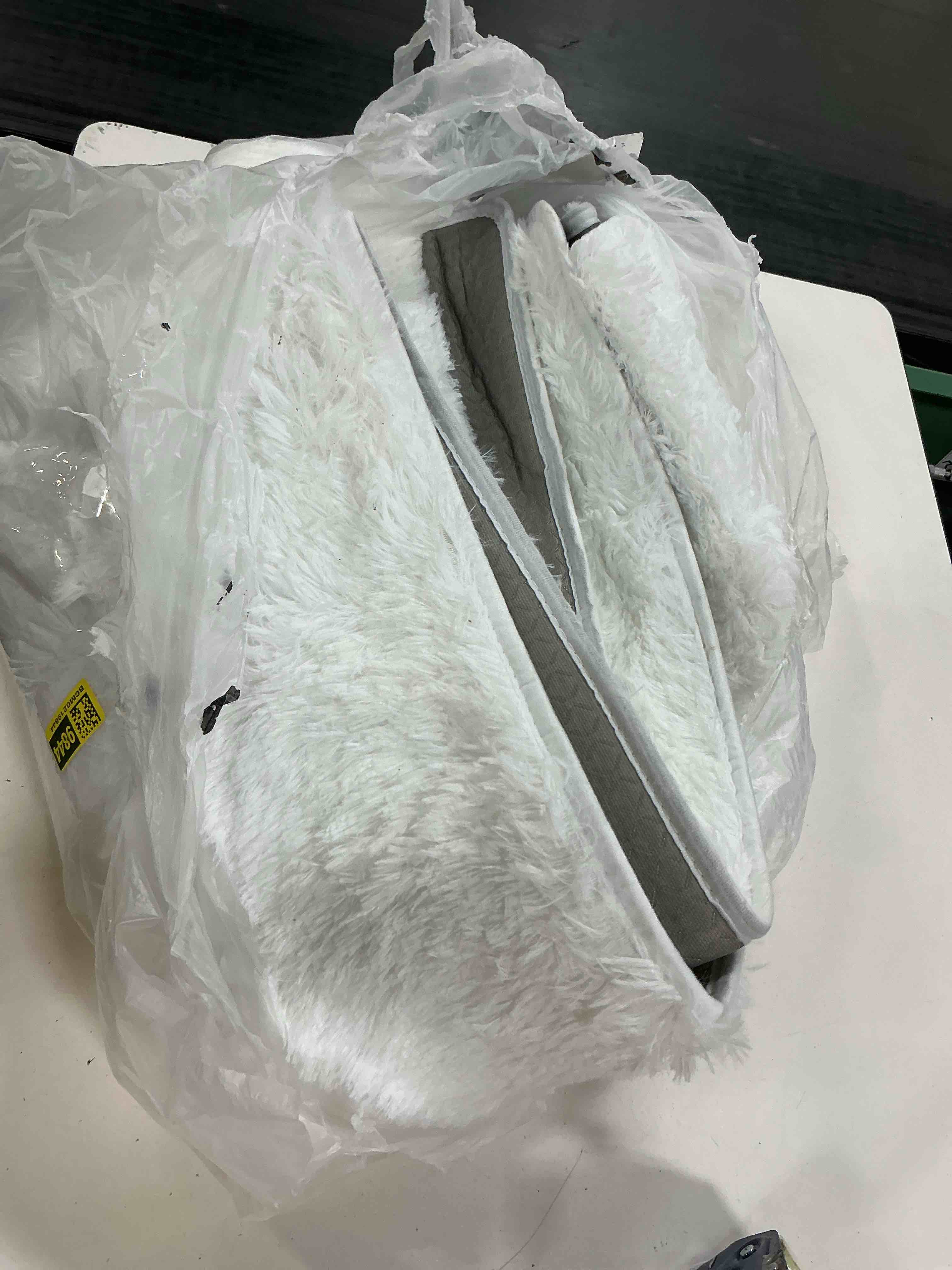 Condition photo showing As Is for white soft shag rug, medium