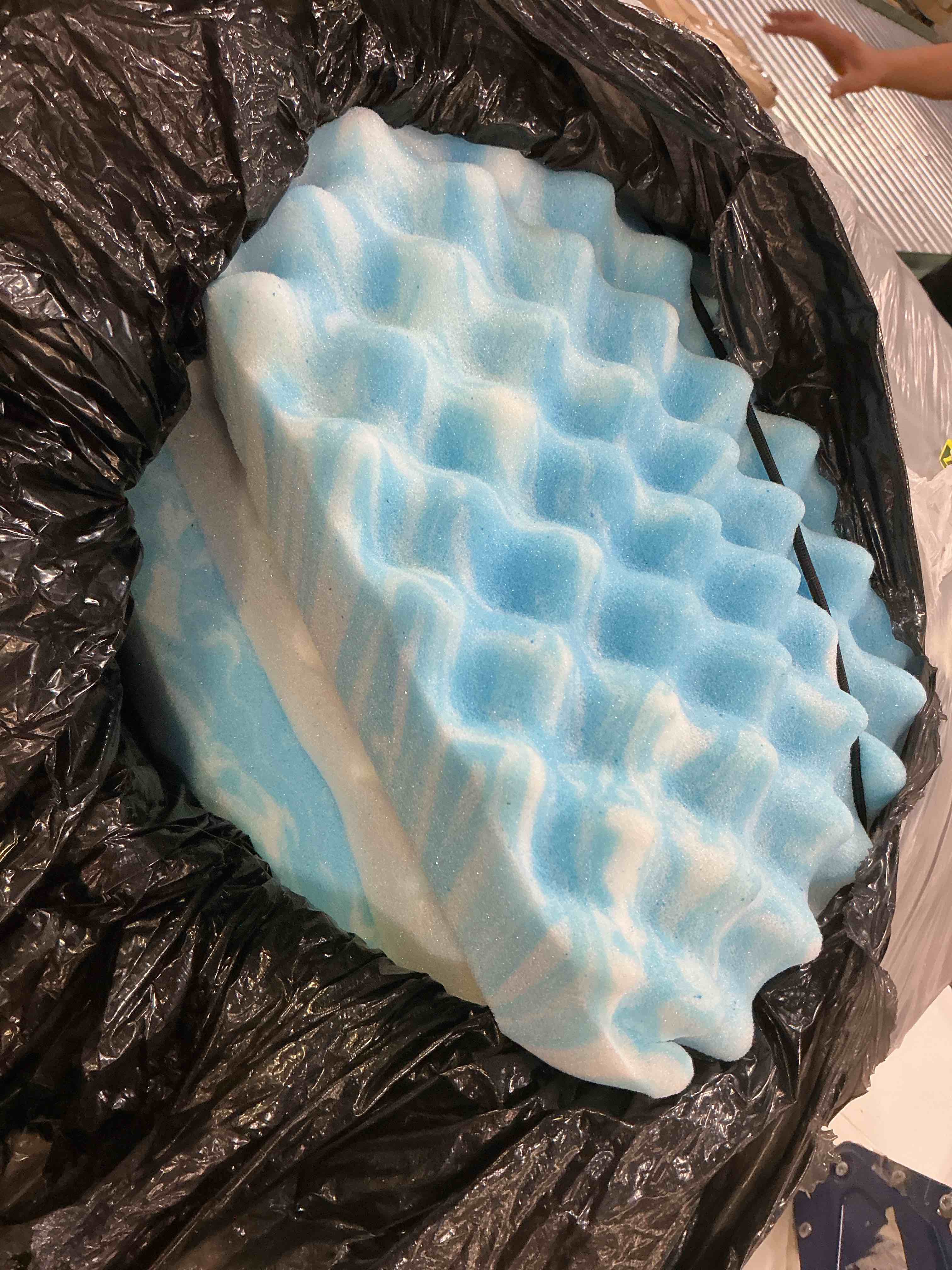 Condition photo showing As Is for coolong eggcrate mattress topper (size unknown)