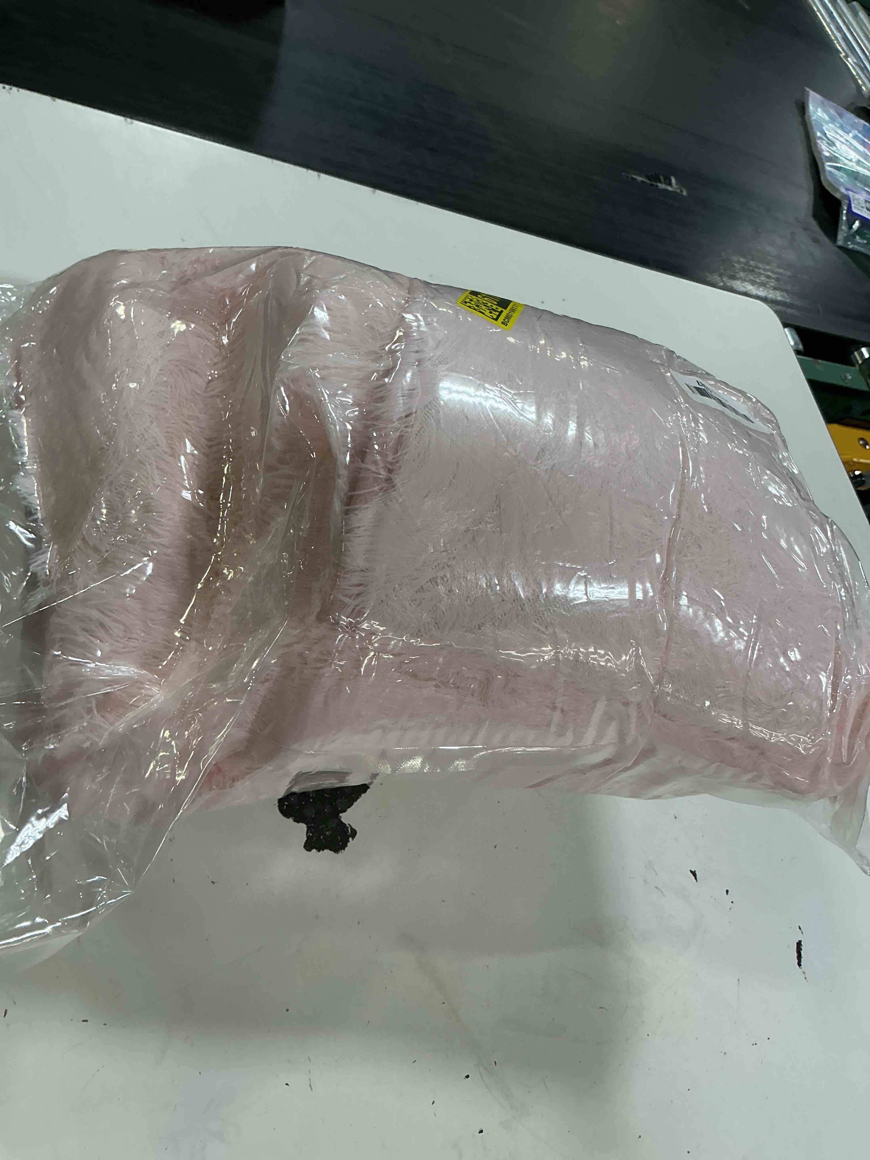 Condition photo showing New/Like New for pink soft shag rug, medium