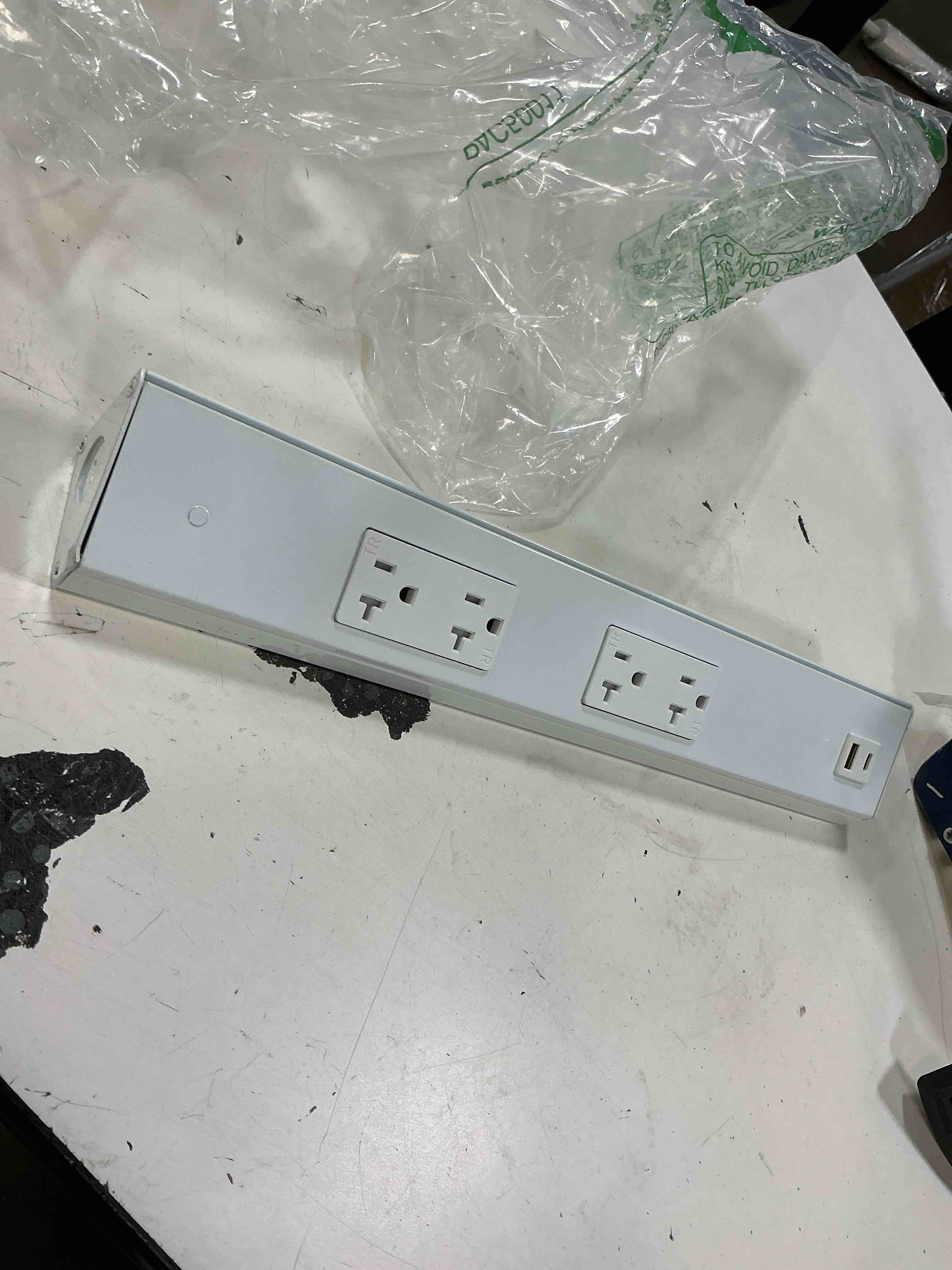 Condition photo showing As Is for 16inch hardwired power strip with 4 tamper resistant outlets and 2 type a usb, white