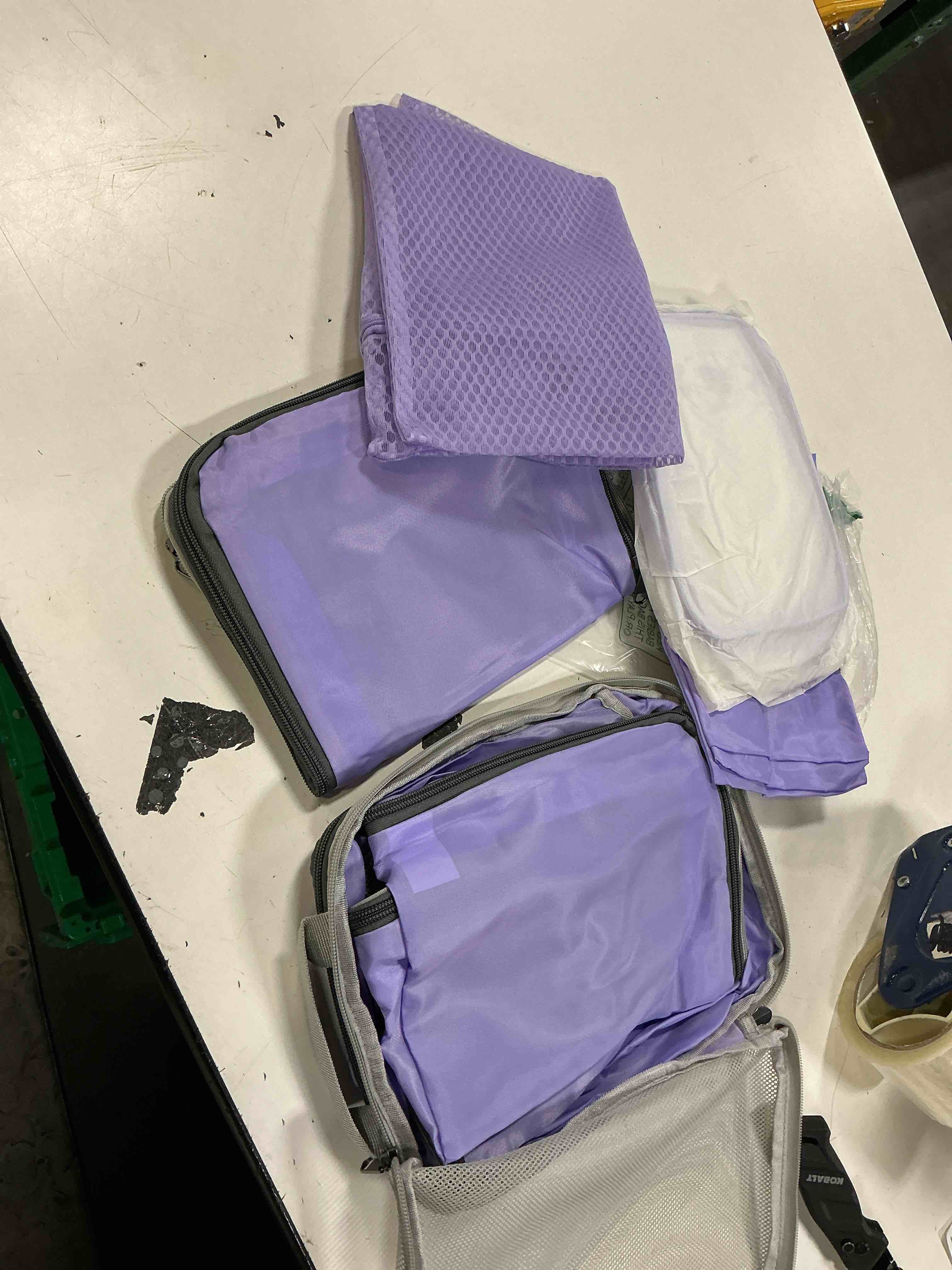 Condition photo showing Good Condition for purple mesh lightweight travelers set