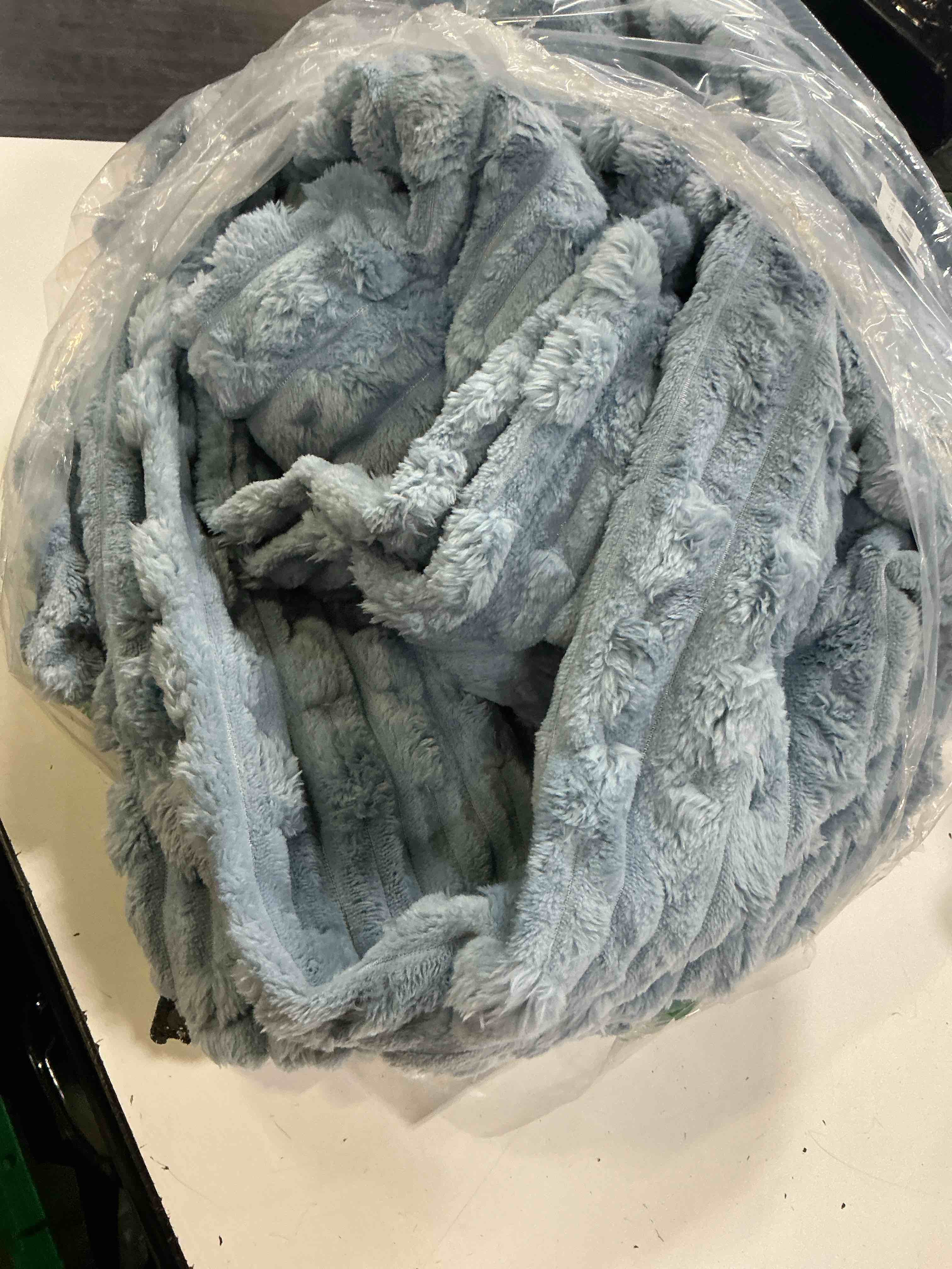 Condition photo showing As Is for light blue polyester blanket