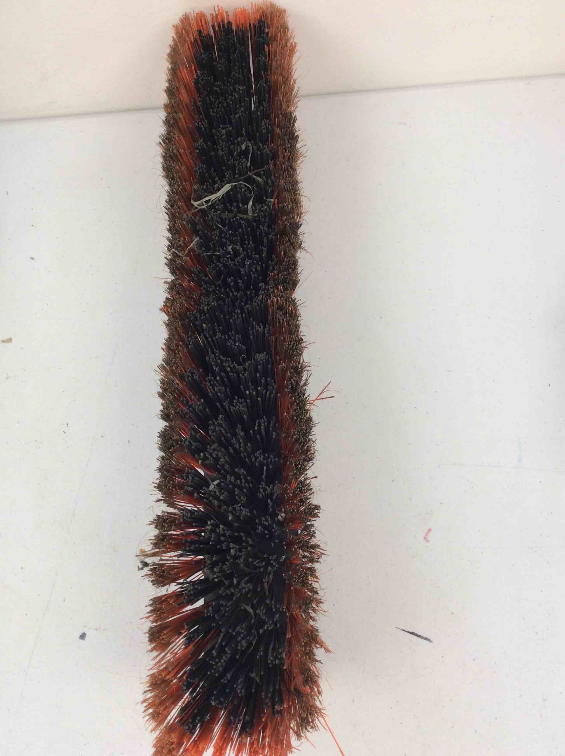 Condition photo showing As Is for dirty orange push broom