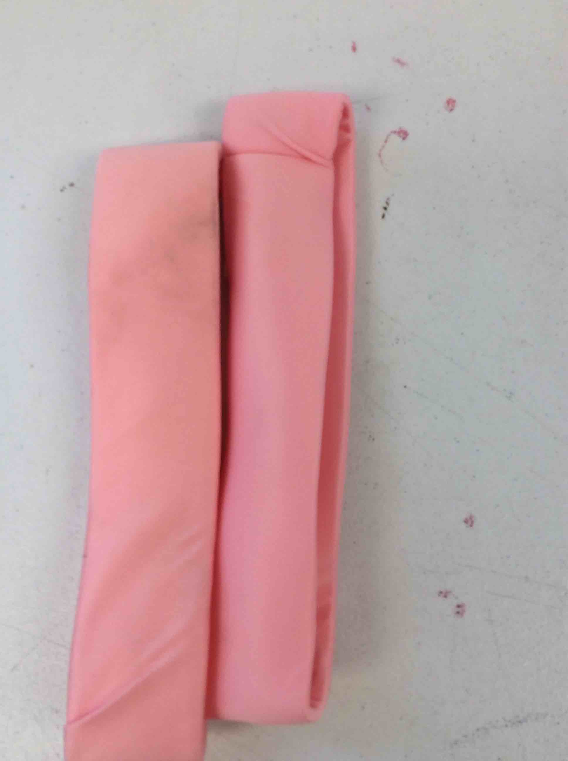 Condition photo showing New/Like New for two pink bands