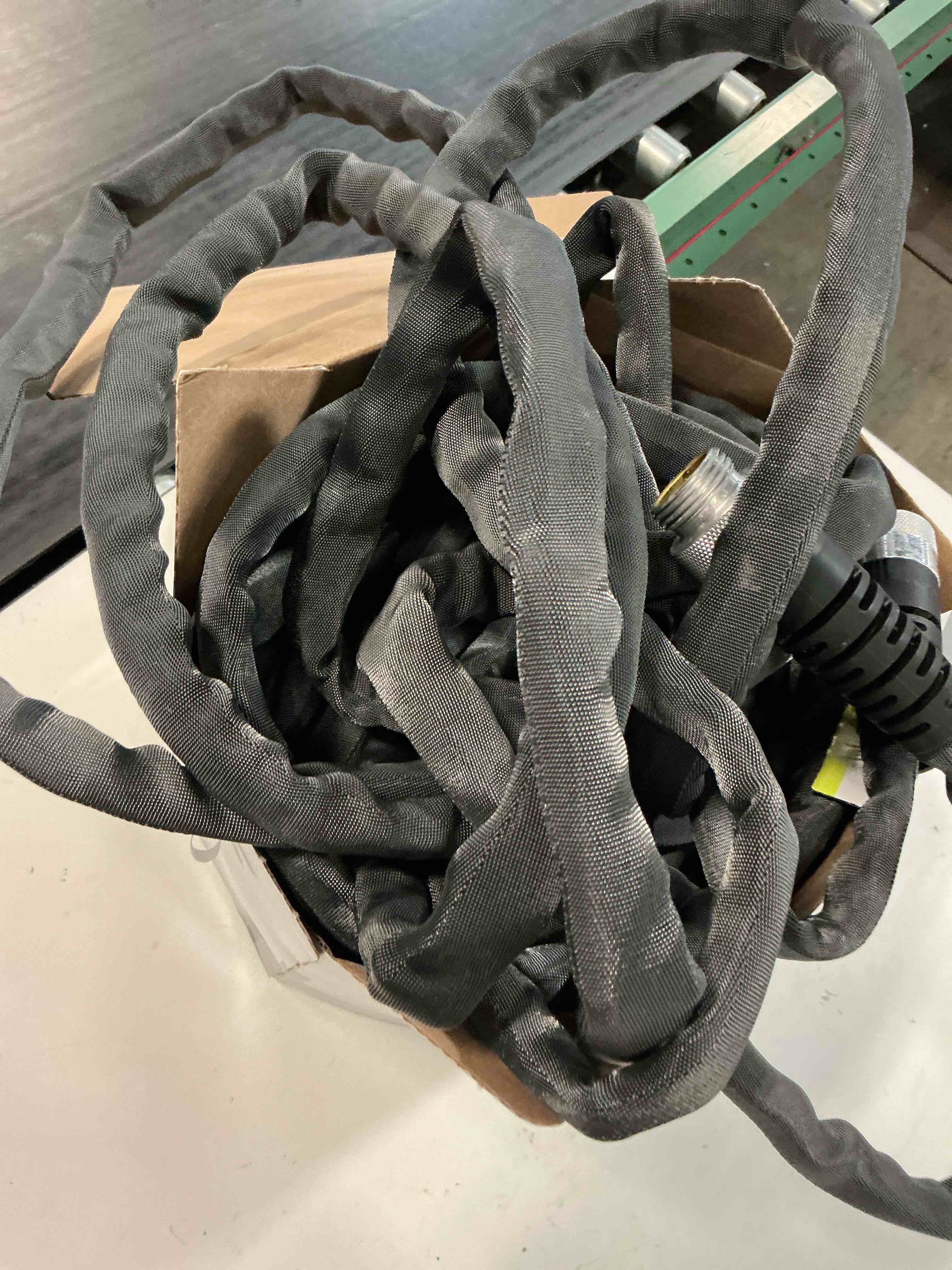 Condition photo showing As Is for teknor apex zero-g 5/8 in. d x 100 ft. l heavy duty commercial grade garden hose