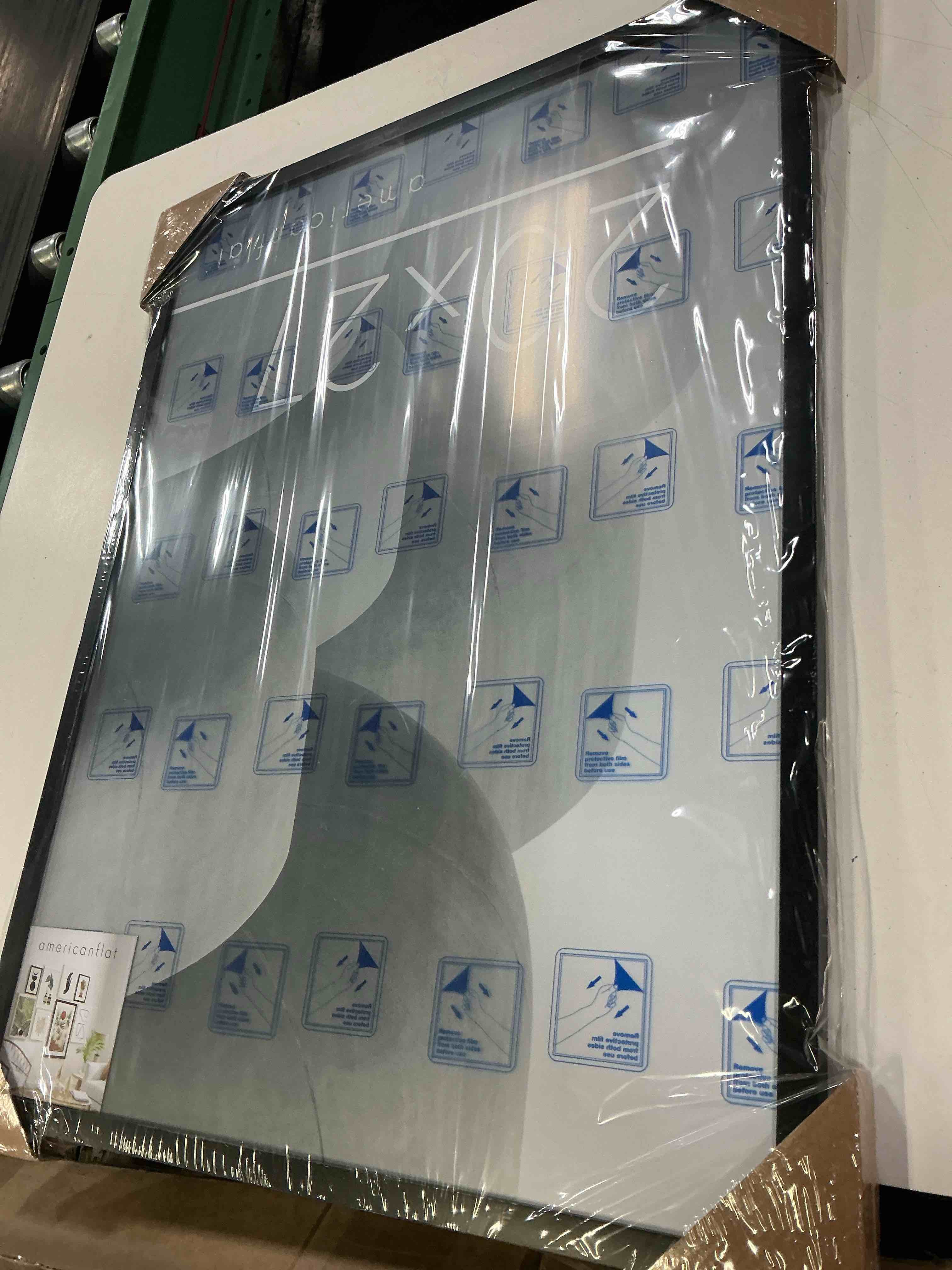 Condition photo showing Good Condition for americanflat 20x27 picture frame with polished plexiglass - streamline collection - thin border picture frame for wall display - hanging hardware included - black 20x27 black