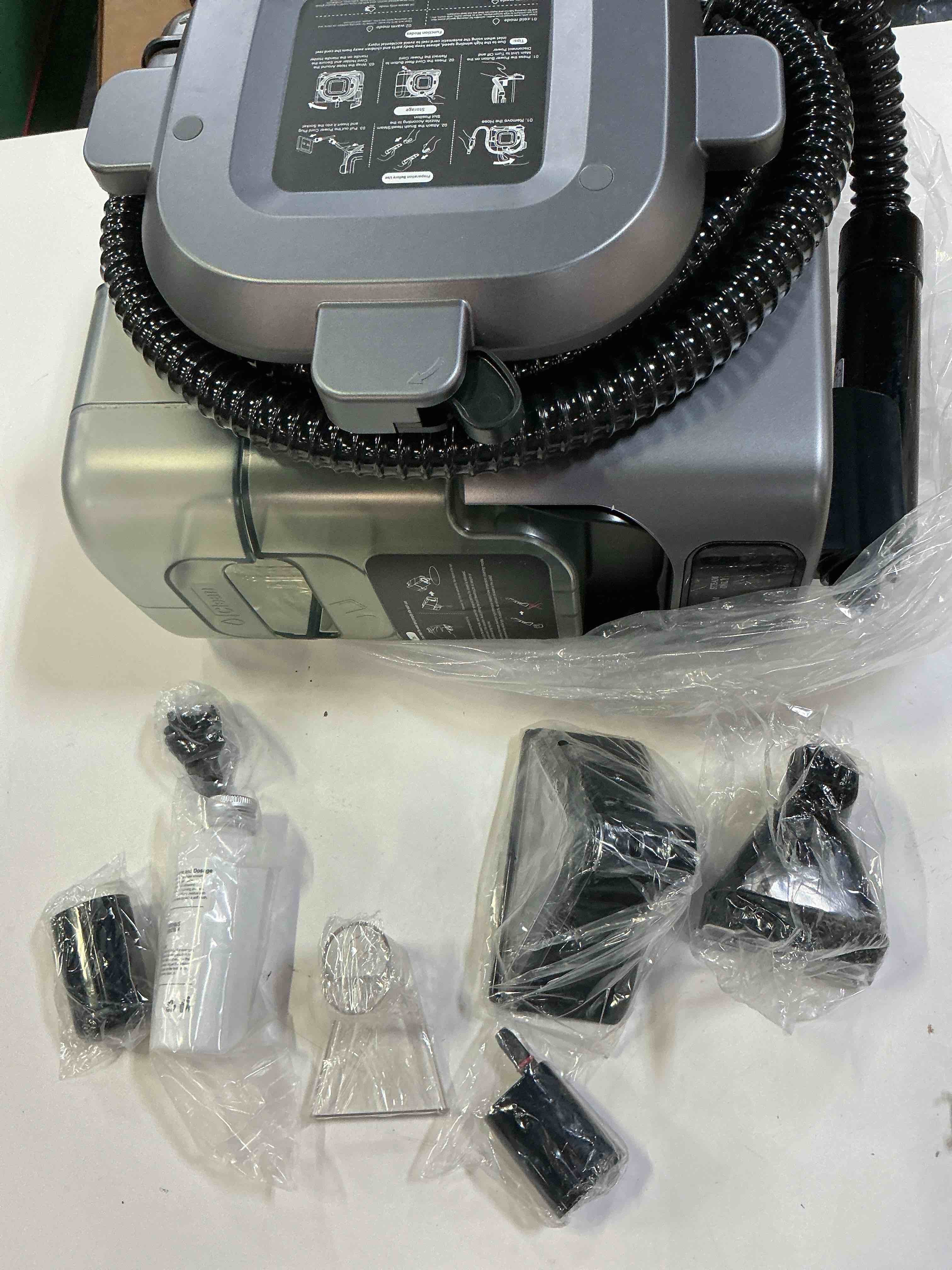 Condition photo showing As Is for (damaged, its a broken )starrybot portable carpet cleaner