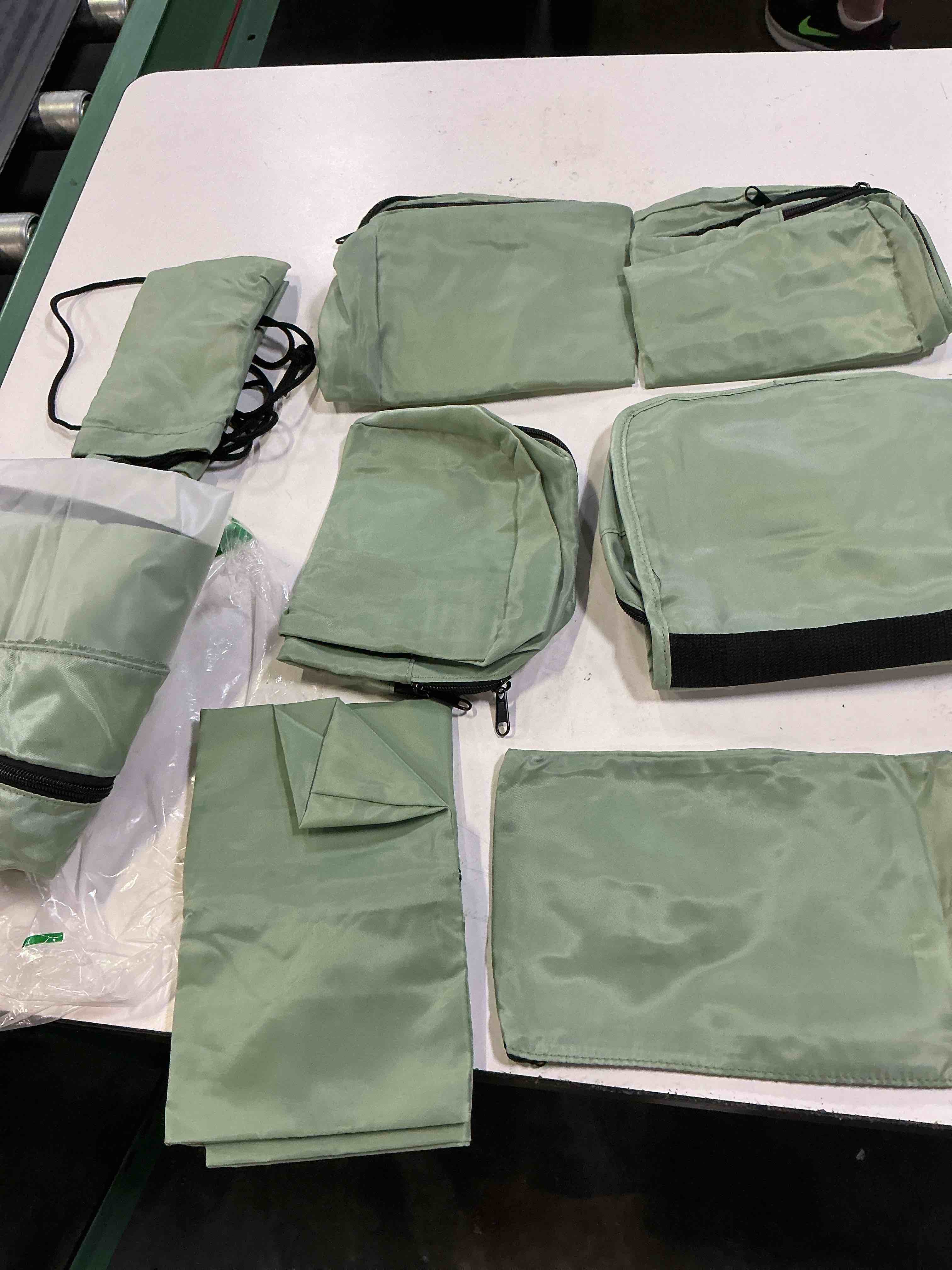 Condition photo showing As Is for veken 8 set packing cubes for travel essentials,anti-wrinkle buckled suitcase organizer for shoe & toiletry bag,carry on luggage bag with 99+ count mesh holes for airplane & college dorm accessories