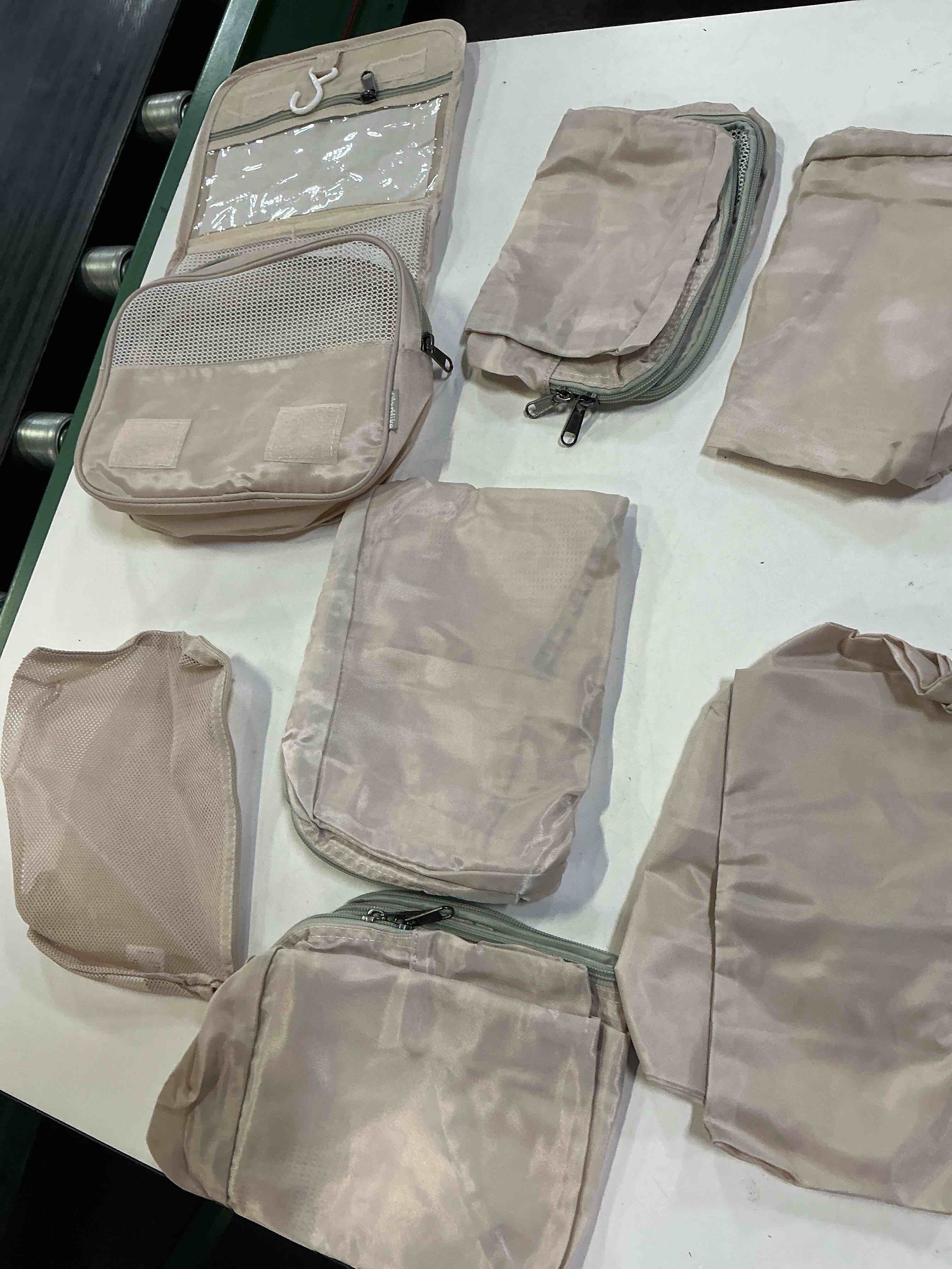 Condition photo showing As Is for (incomplete , only 7 pcs) veken 8 set packing cubes for travel essentials,anti-wrinkle buckled suitcase organizer for shoe & toiletry bag,carry on luggage bag with 99+ count mesh holes for airplane & college dorm accessories