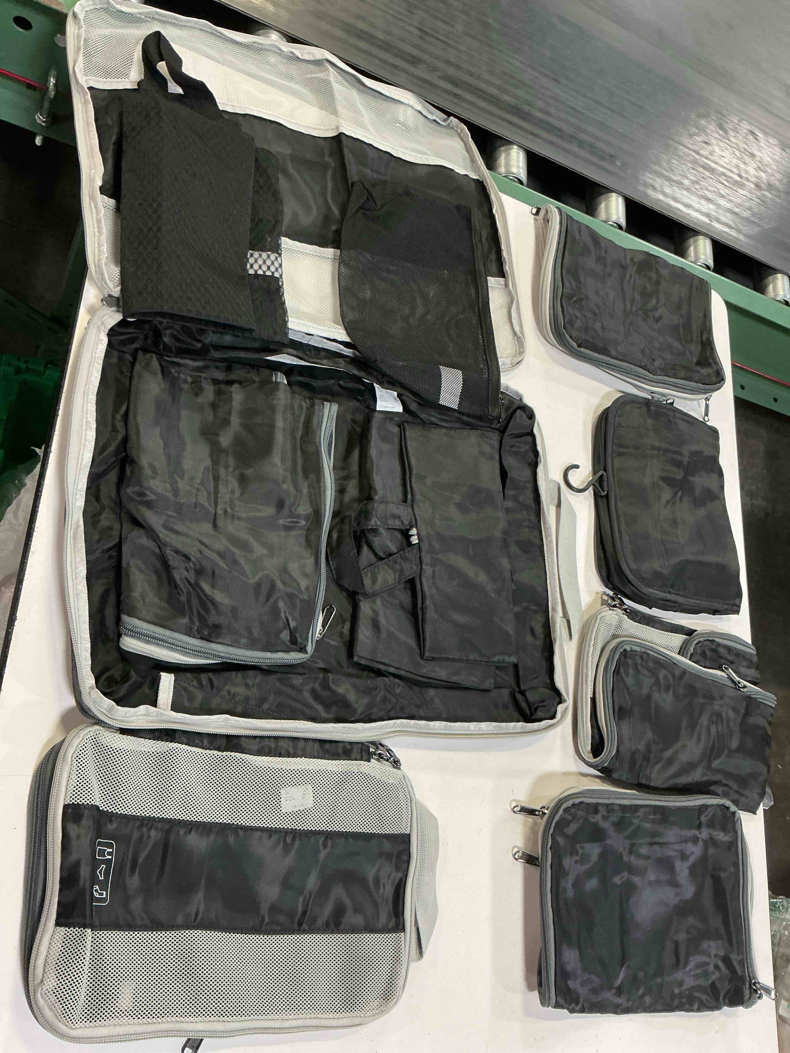 Condition photo showing As Is for veken 10 set packing cubes for travel essentials, suitcase organizer bags in 4 sizes, carry-on luggage accessories with large laundry bag & passport holder, must-have for airplane, road trip & camping 01 black 10 set (for checked/large) 10 set (for checked/large)