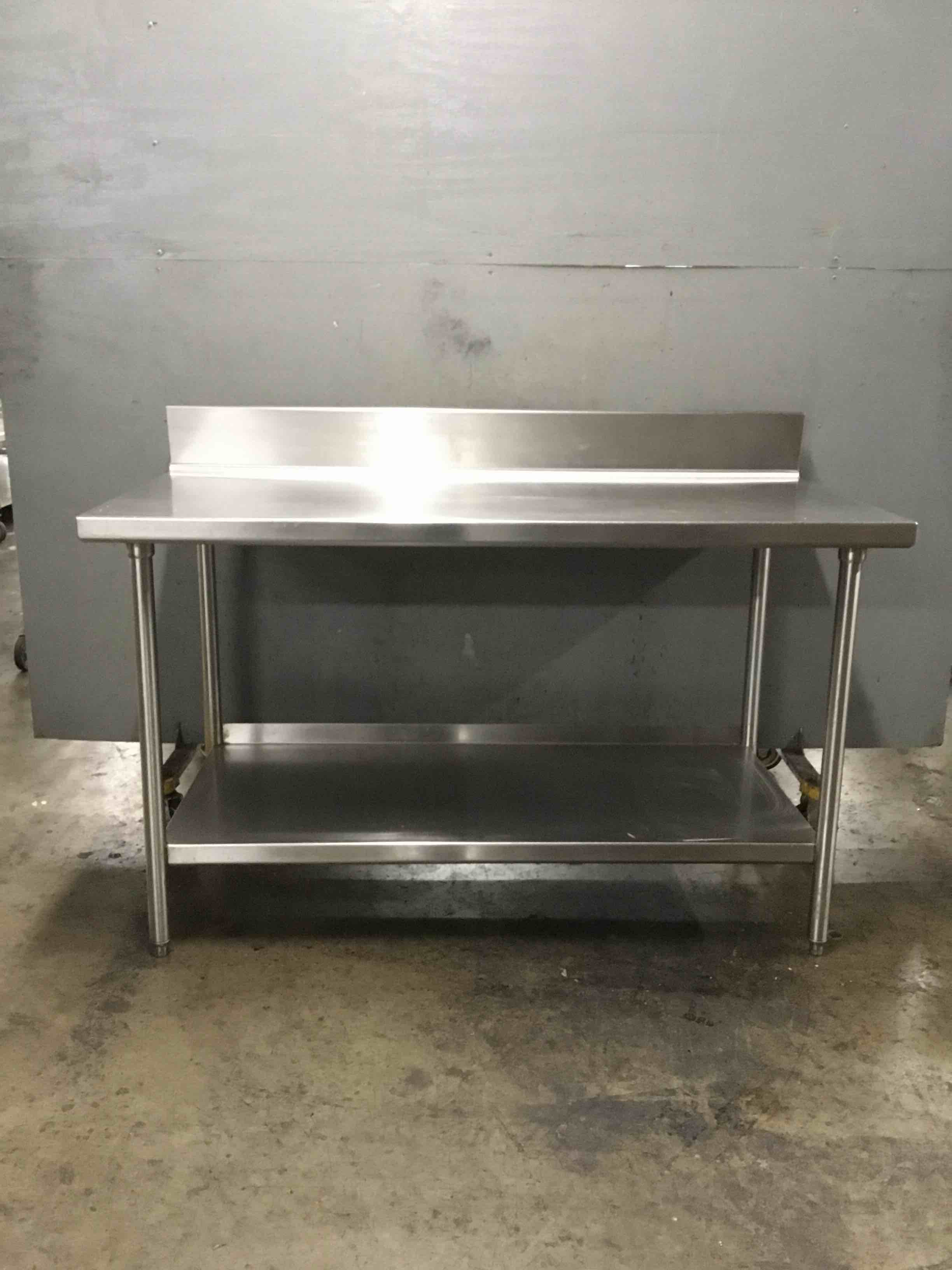 Regency Stainless Steel Table With Under-Shelf And 5 Inch Backsplash 