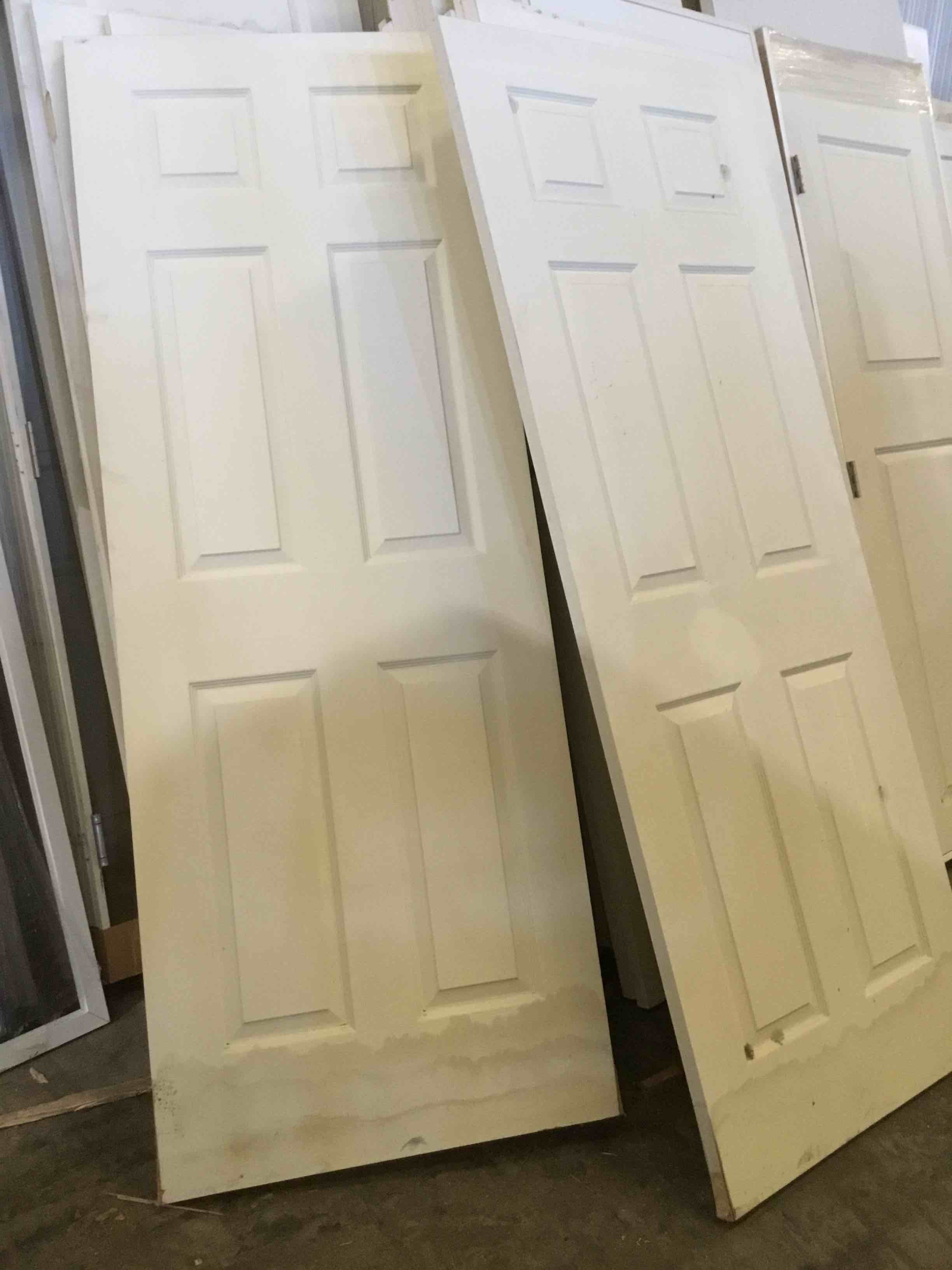 30 in. x 80 in. Primed, Textured, 6 raised panel, hollow core slab 