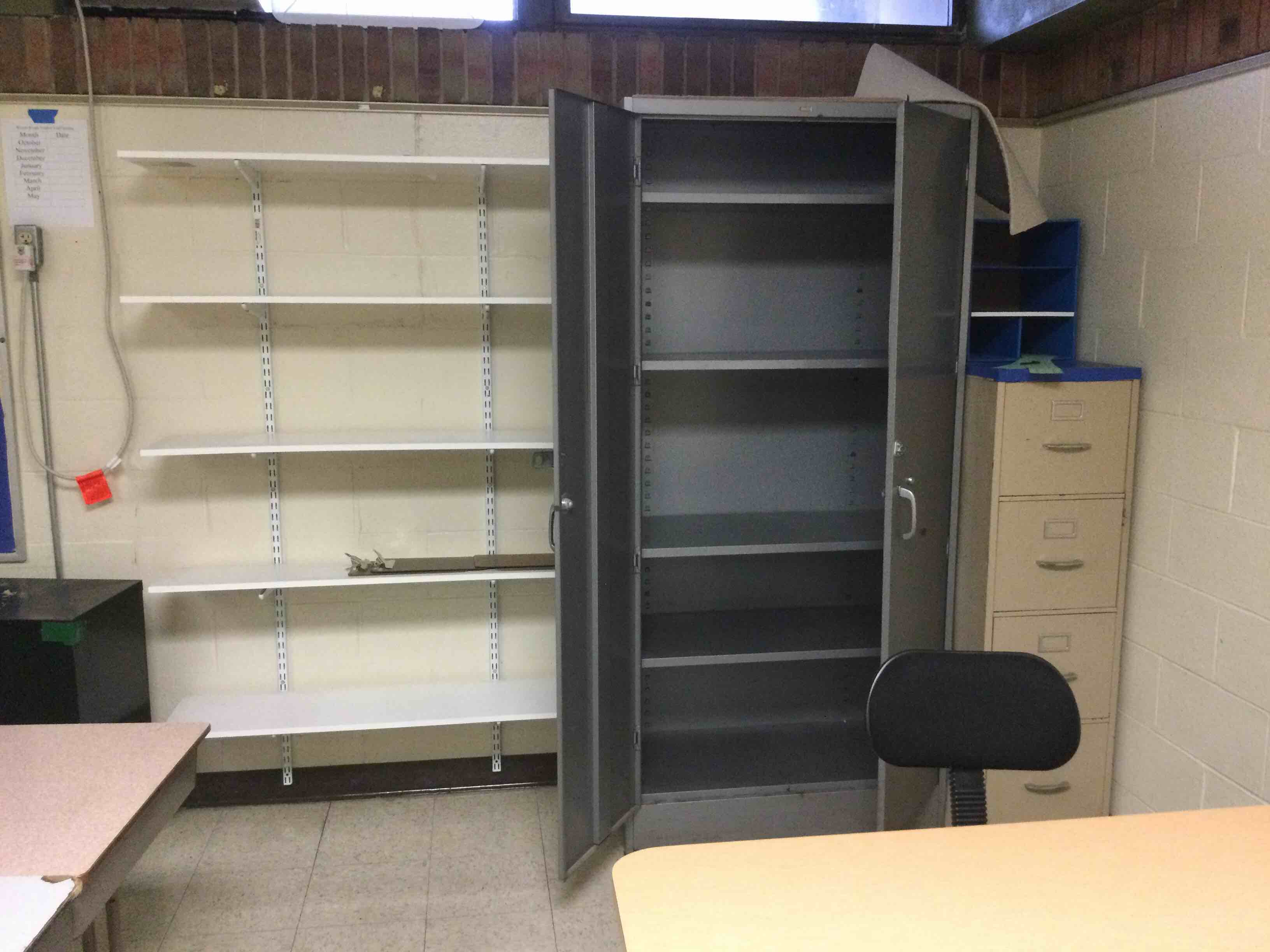 Classroom 205 Contents To Include, Desks, Table, Chairs, Chalk Board, Tack Board, Filing Cabinets, Hand Sanitizer Dispenser, Shelving Units, Ceiling Fans, Air Conditioner, And Doors (Promethean Board And Casio Projector Not Included) 