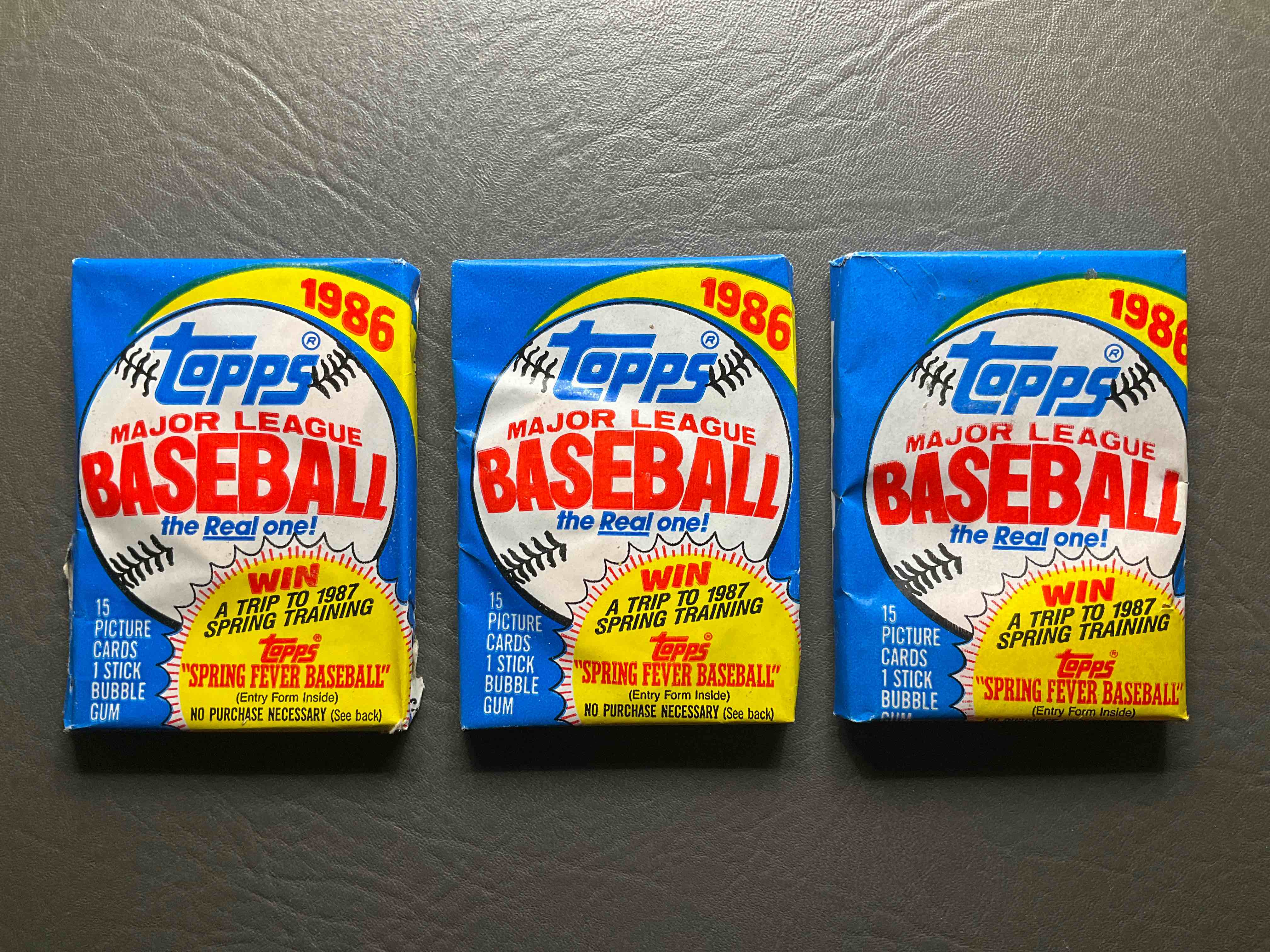 1986 Topps Baseball Unopened Wax Packs Direct From Original Sealed Case! Search For Pete Rose & Nolan Ryan (PSA 10 Worth $1,000) & Other Valuable 80s Stars!  Note One Package Has Slight Tear (see photos).