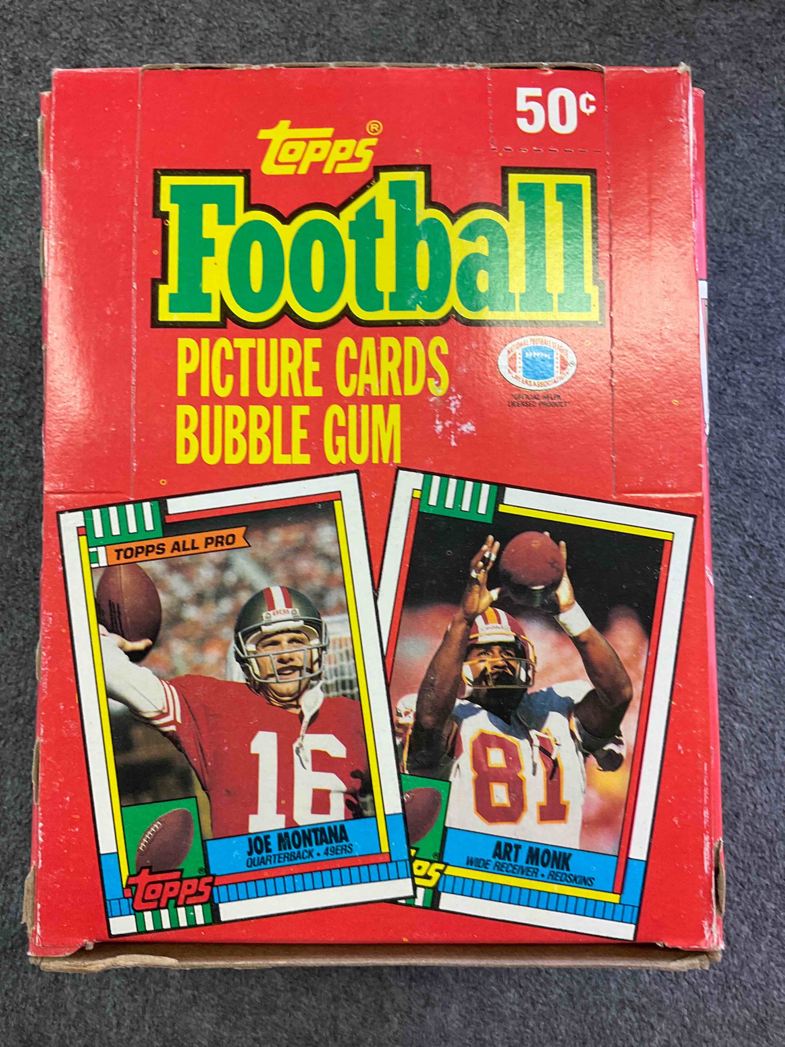 1990 Topps Football Unopened Wax Packs Direct From Original Box! Look For Emmitt Smith Rookie Cards, As Well As Early Joe Montana & Barry Sanders Cards!