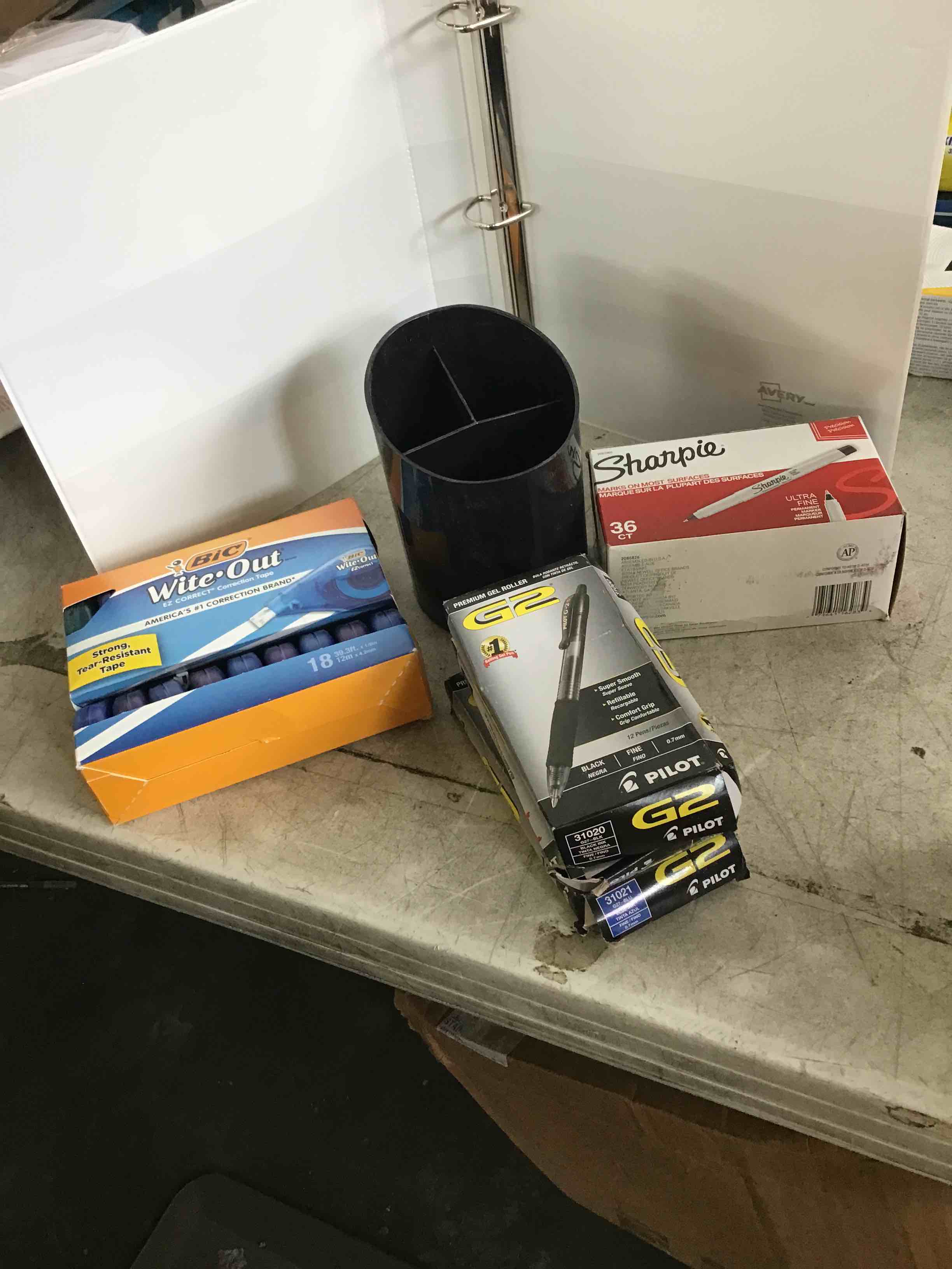 assorted office & school supplies.    (3 pks of pilot pens) ( 1 box of sharpie permanent markers) (1 box of wite- out) (1 orgnizer) ( 1 white binder) 