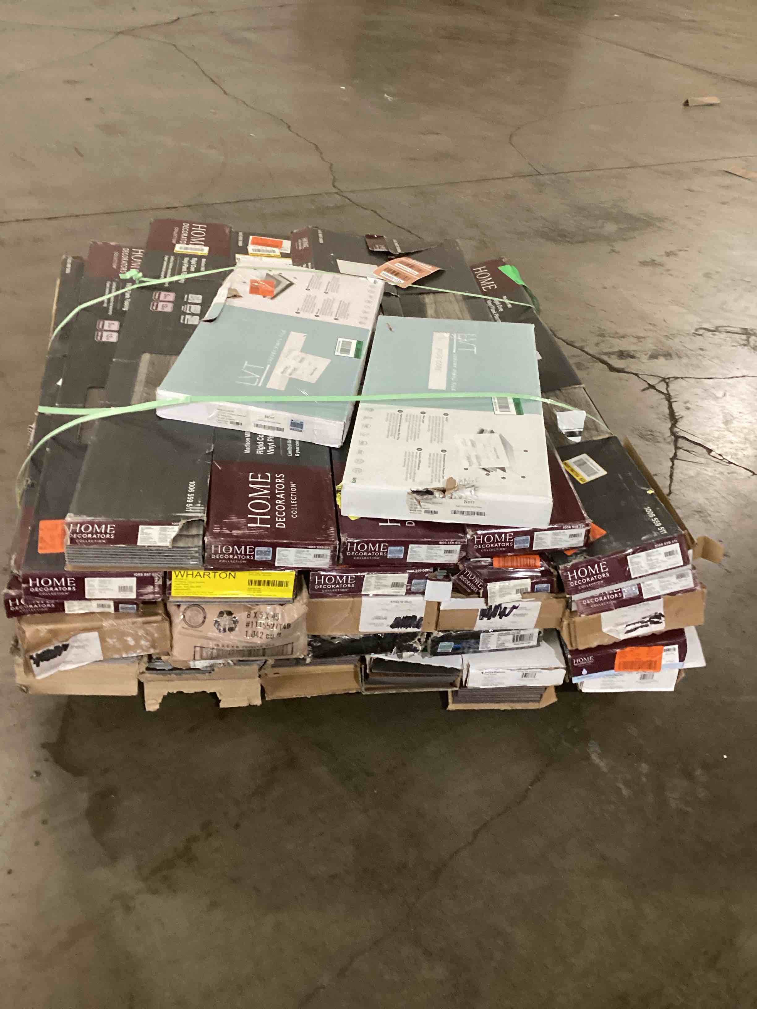 Assortment of  Vinyl Flooring Planks, 27 Boxes. Your bid per box.