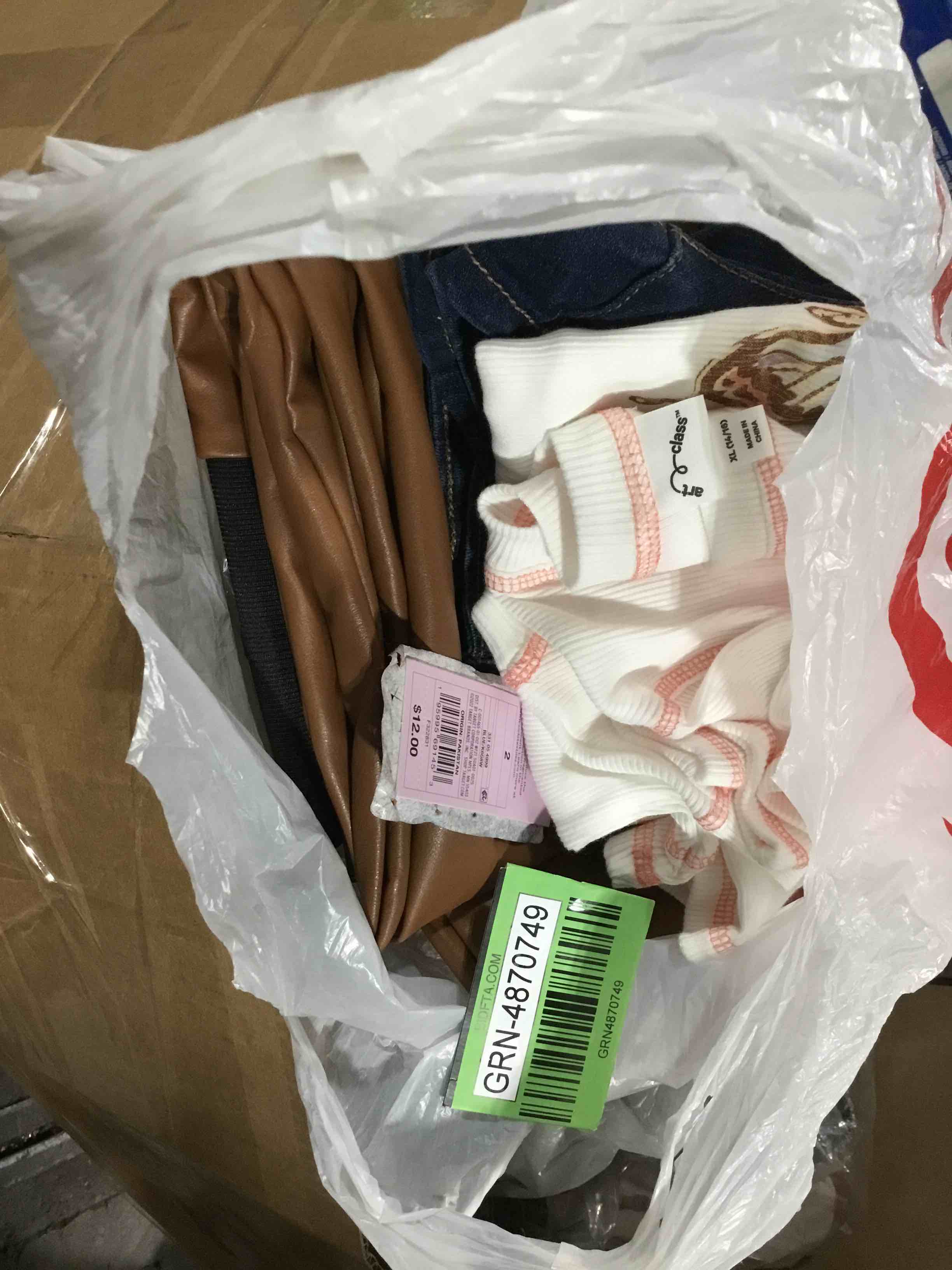 Assortment of clothes children’s and lady’s 