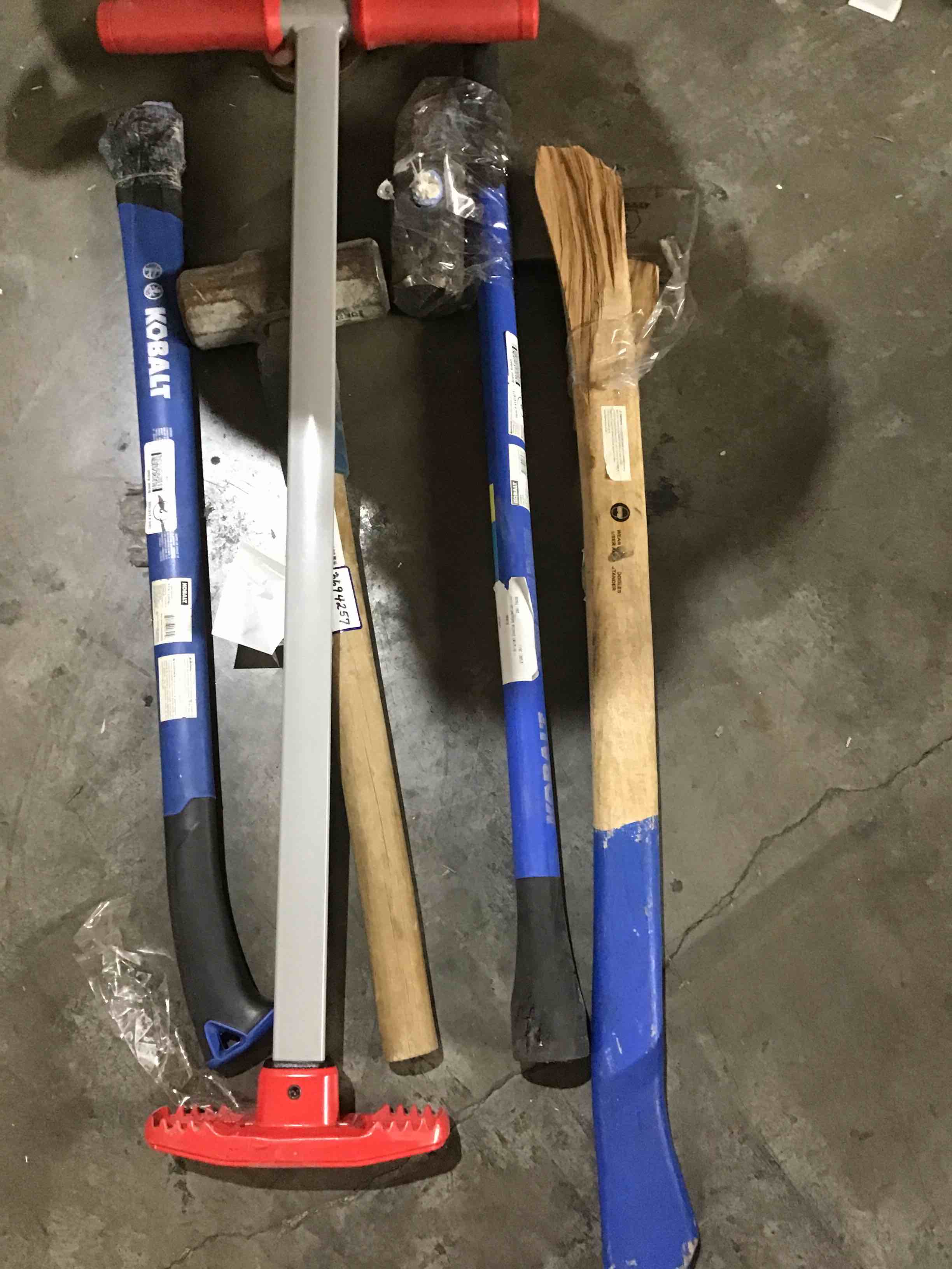 Assortment of Axes, sledge hammers