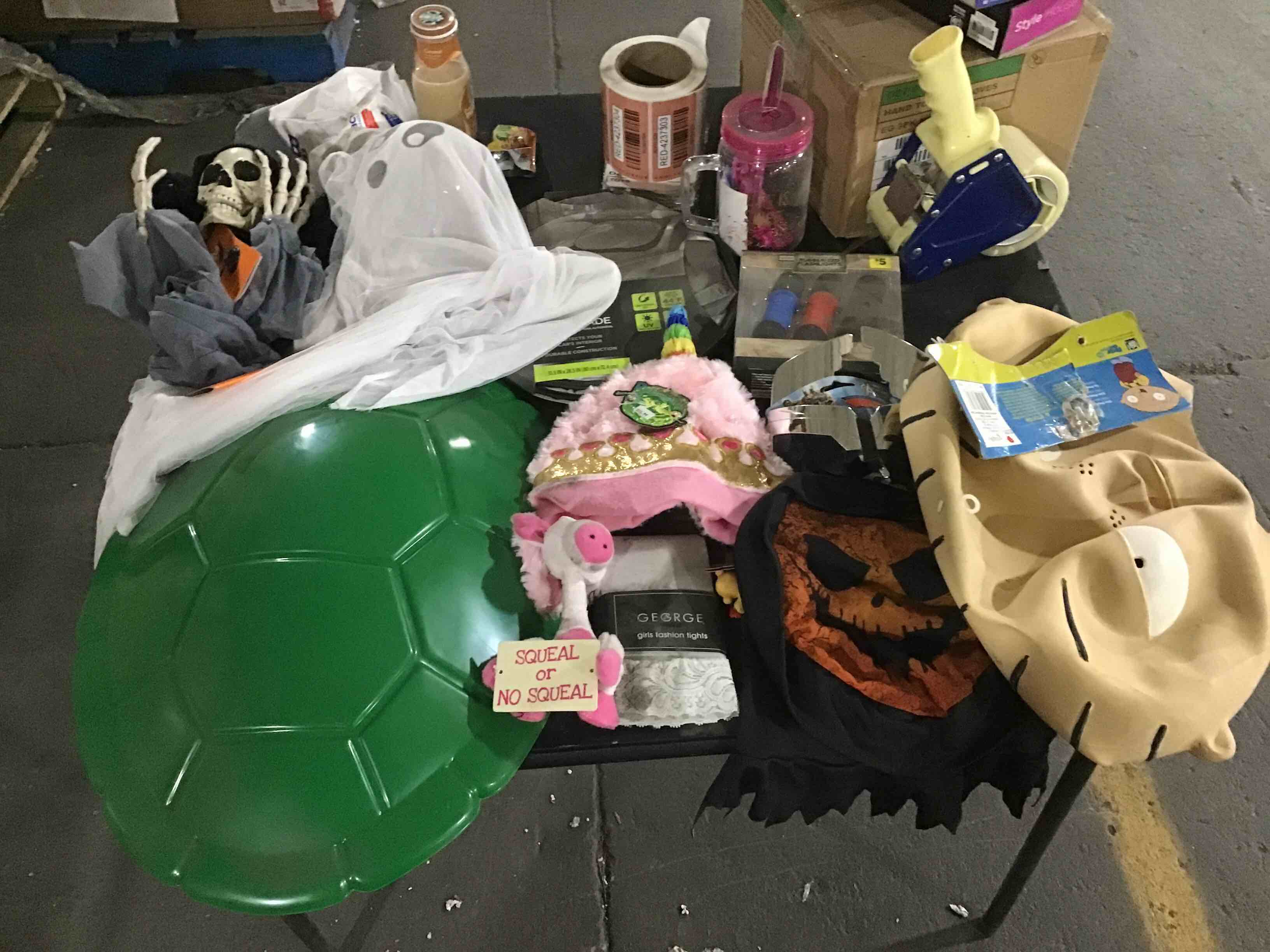 assorted Halloween decorations and costumes