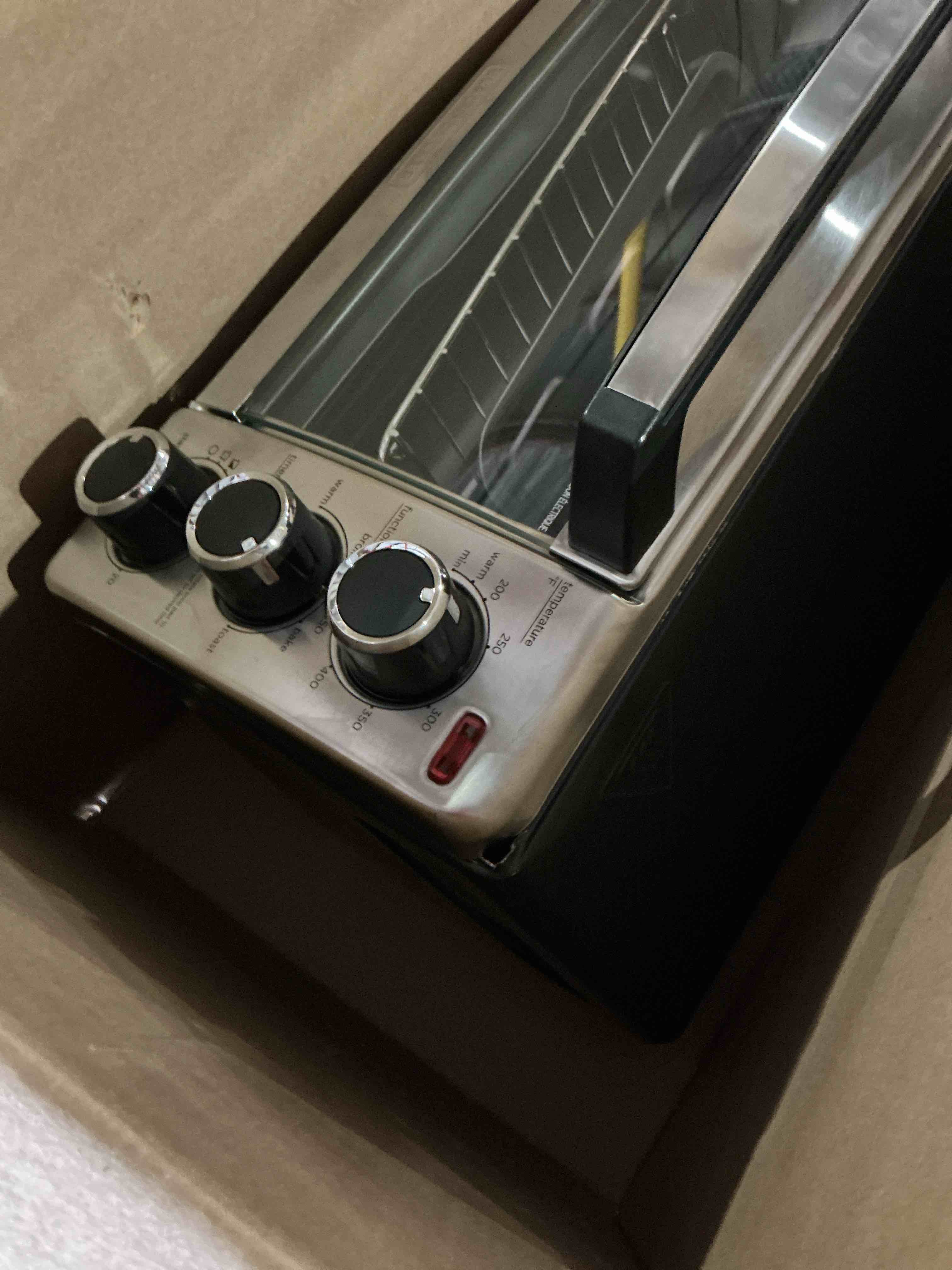 Condition photo showing As Is for black+decker to1313sbd toaster oven, 15.47 inch, silver