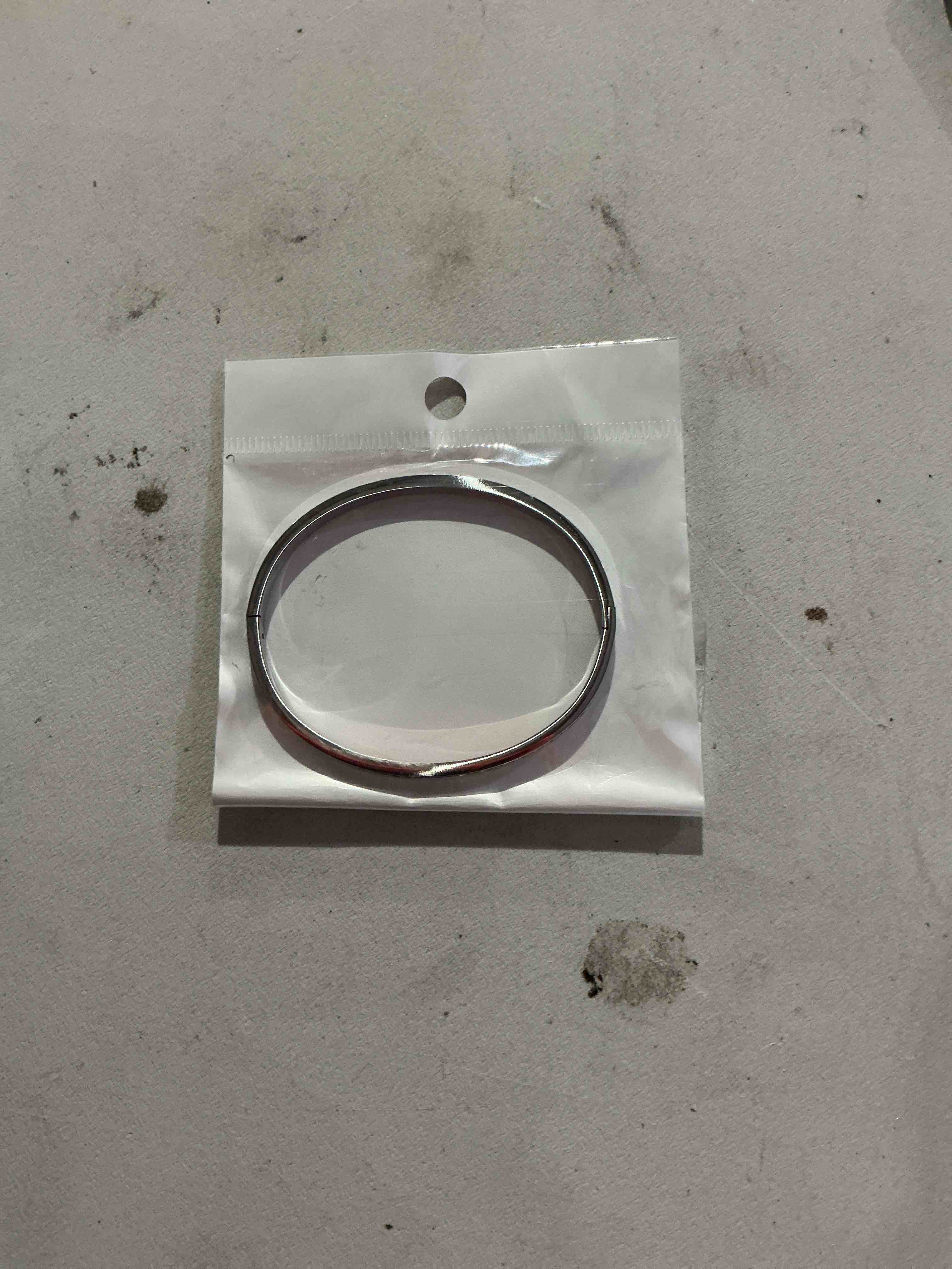 Condition photo showing New/Like New for elegant and timeless, polished bangle bracelet