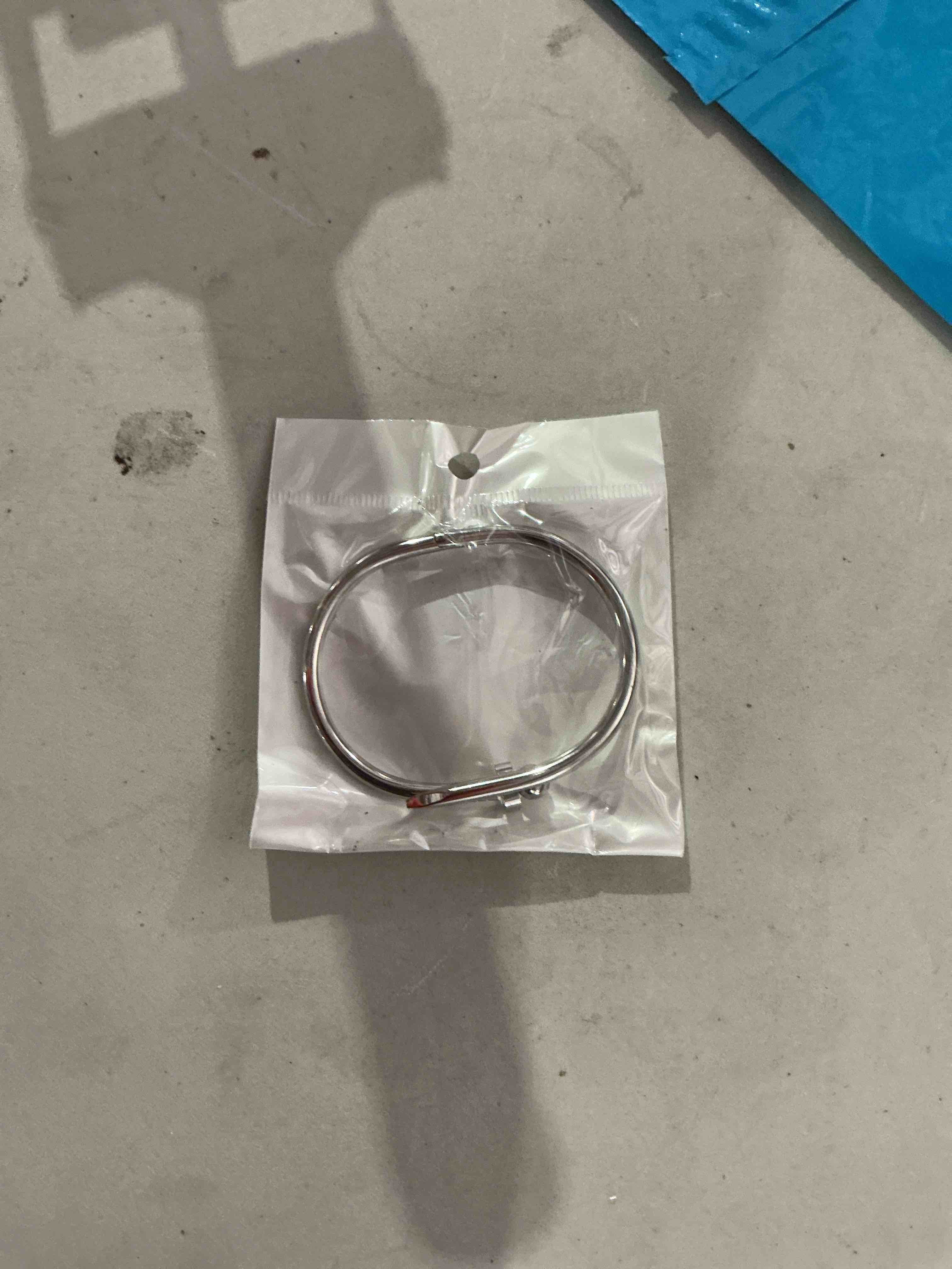 Condition photo showing New/Like New for elegant and timeless, polished bangle bracelet 