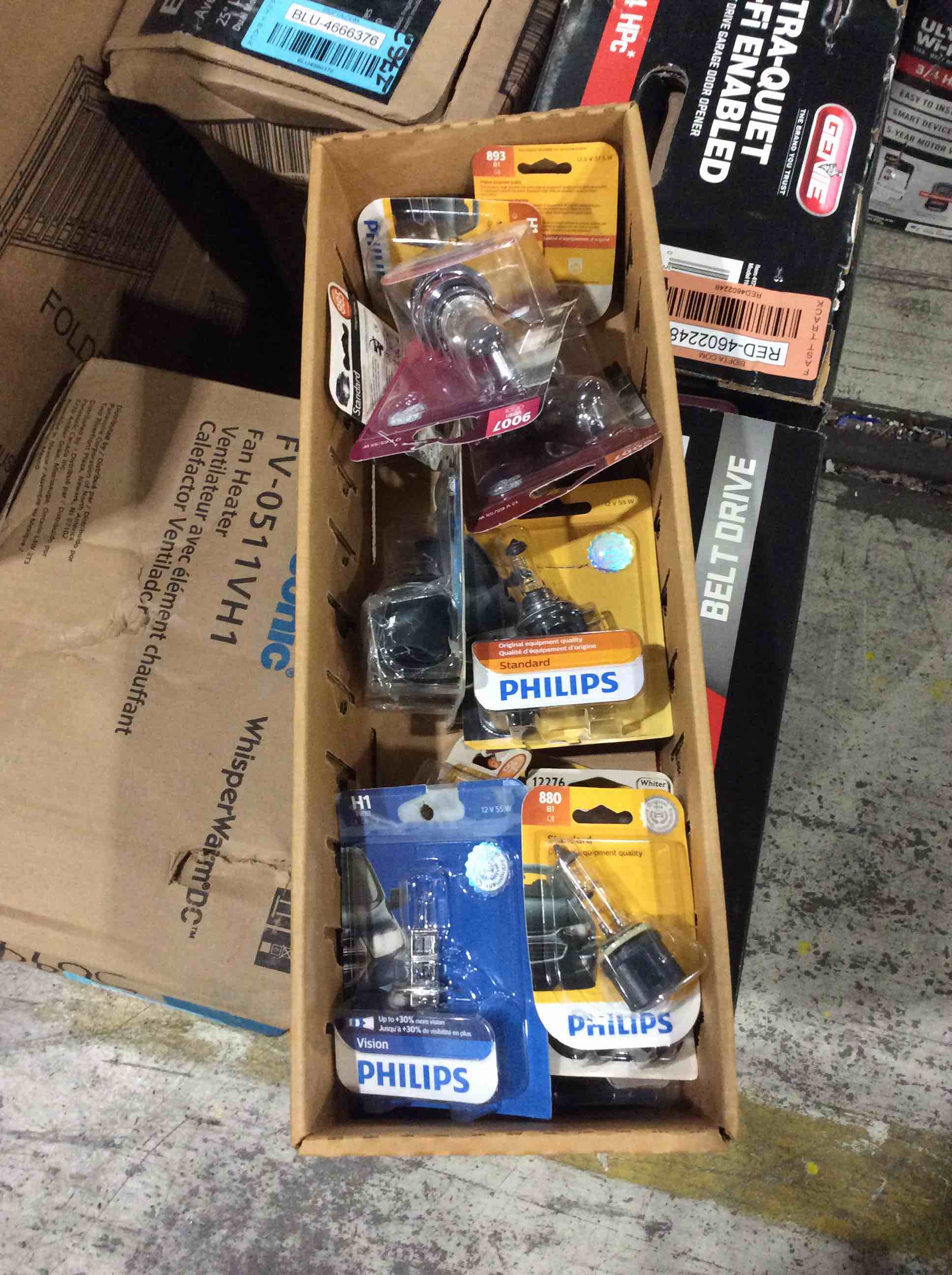 lot of assorted size headlight bulbs