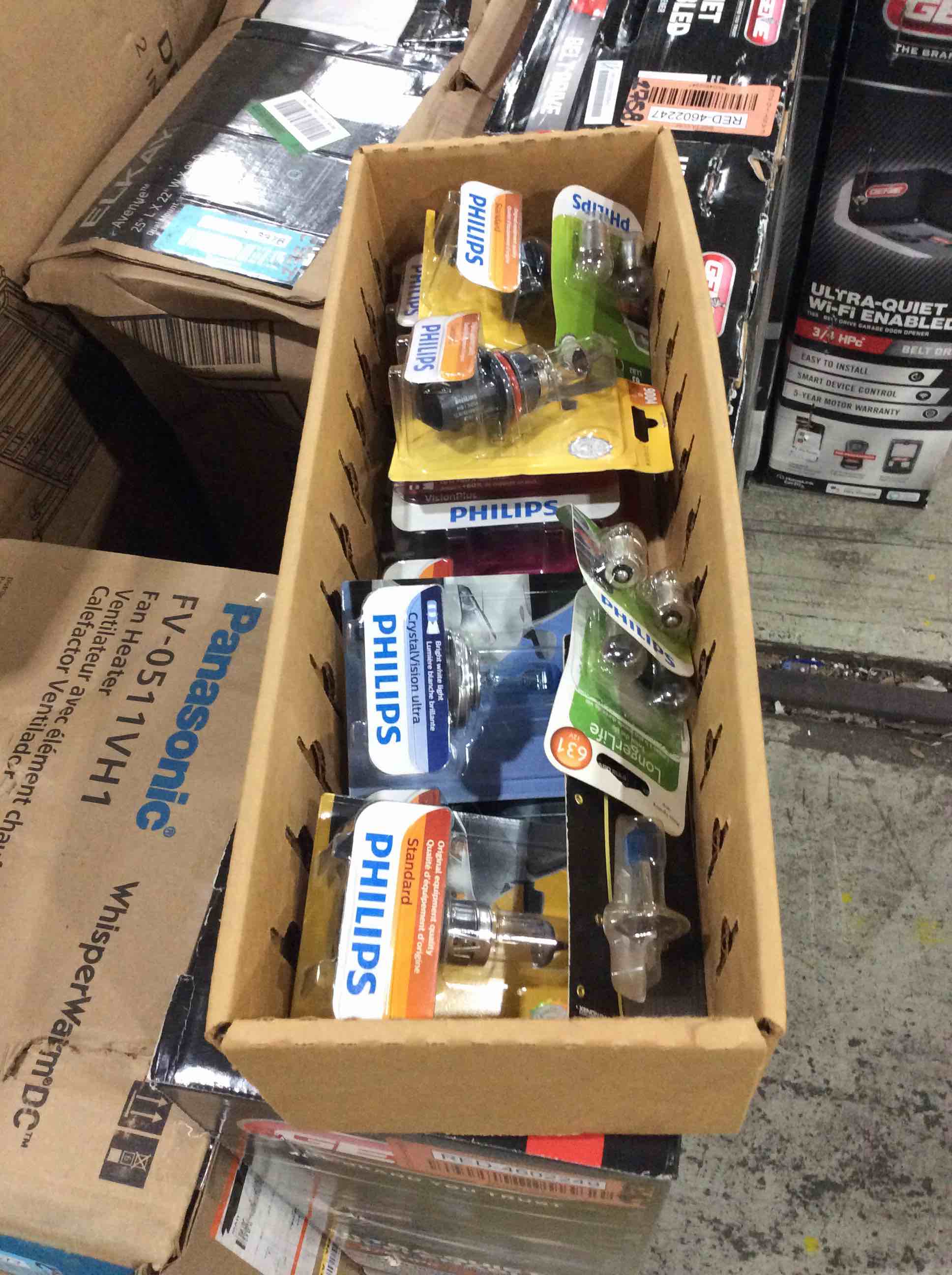 lot of assorted size headlight bulbs