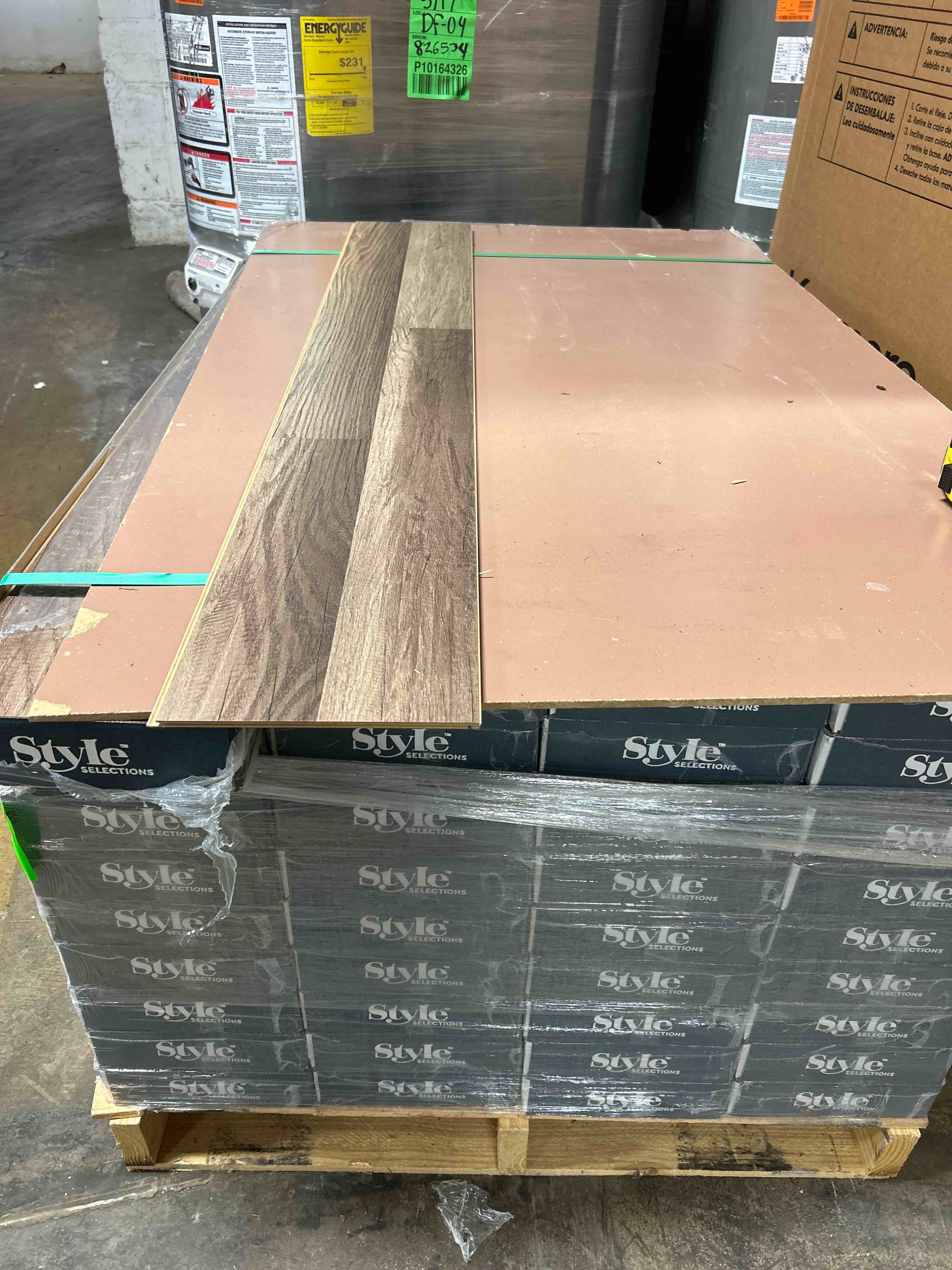 36 boxes, 8 mm aged gray oak laminate flooring, 771.84 ft.² total your b.i.d. per square foot